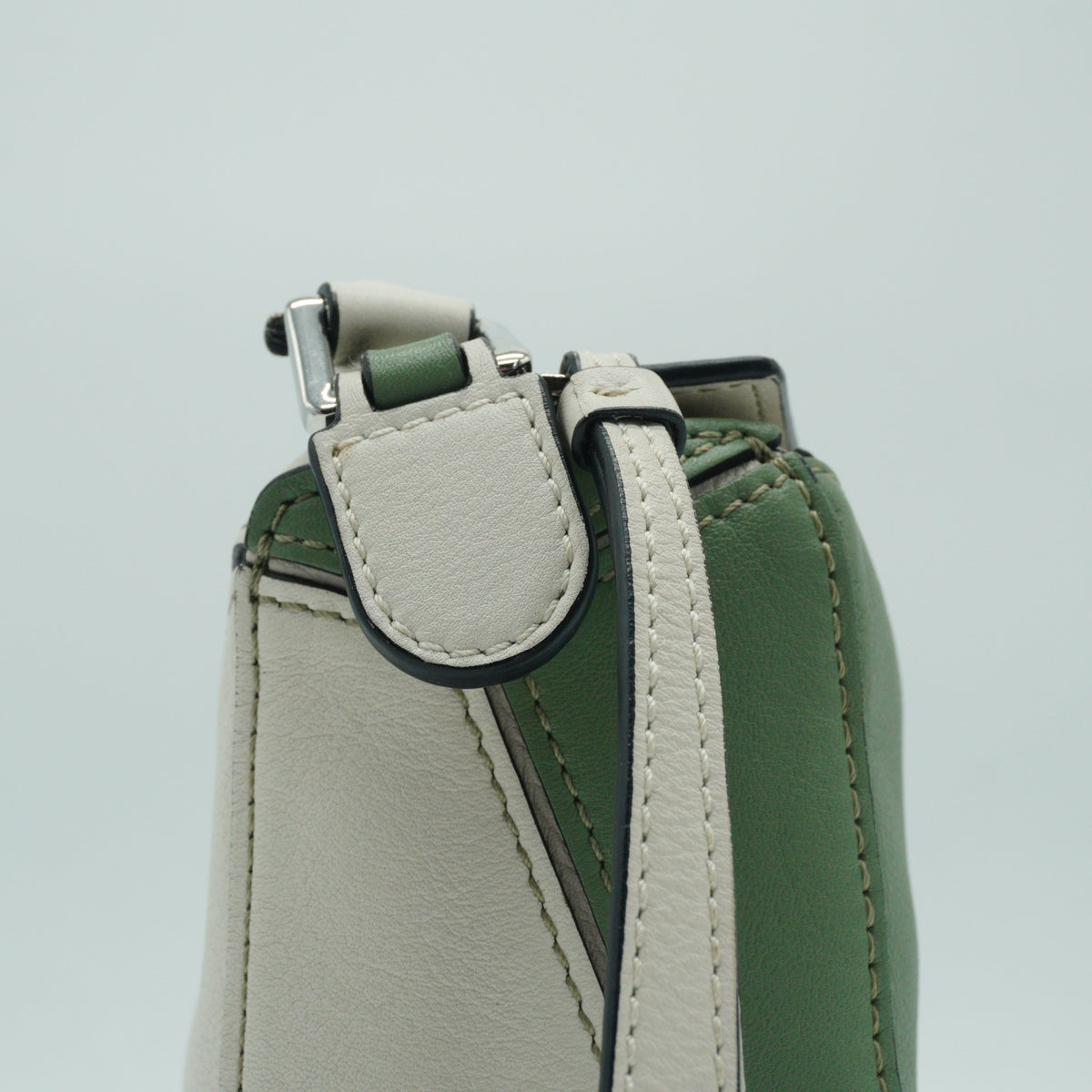 Loewe	Mini Puzzle Bag in a color-blocked soft white rosemary green and black