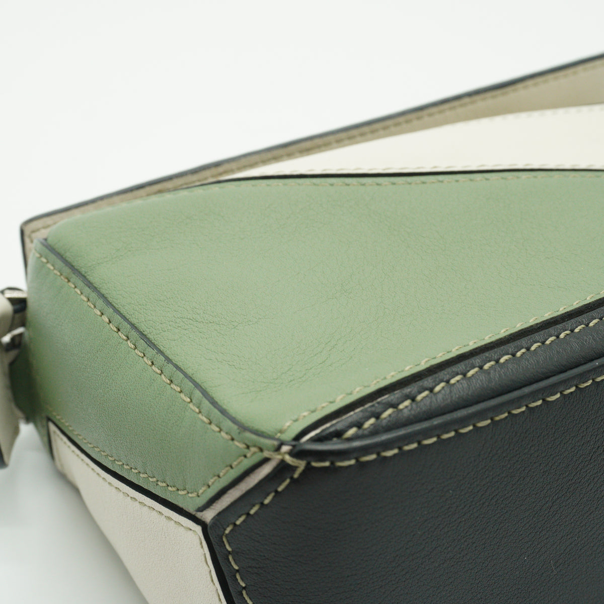 Loewe	Mini Puzzle Bag in a color-blocked soft white rosemary green and black