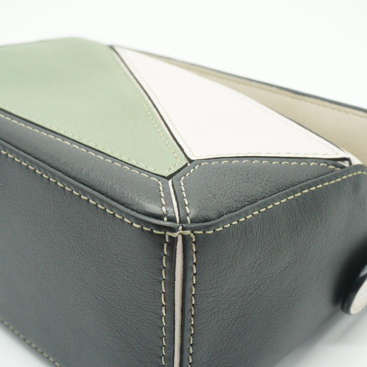 Loewe	Mini Puzzle Bag in a color-blocked soft white rosemary green and black