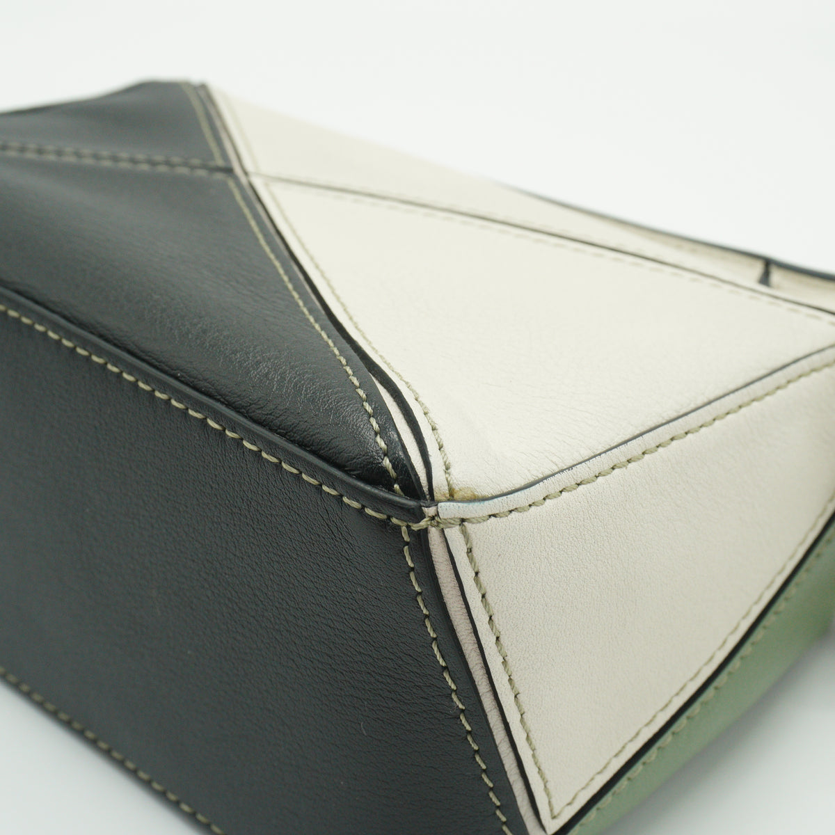 Loewe	Mini Puzzle Bag in a color-blocked soft white rosemary green and black