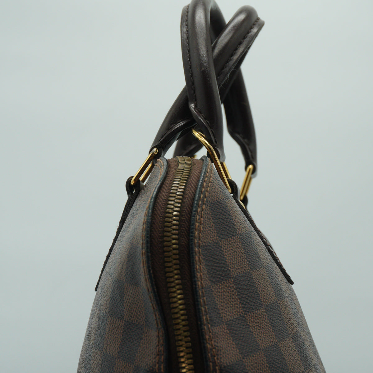 Louis Vuitton	Alma PM Damier Ebene GHW