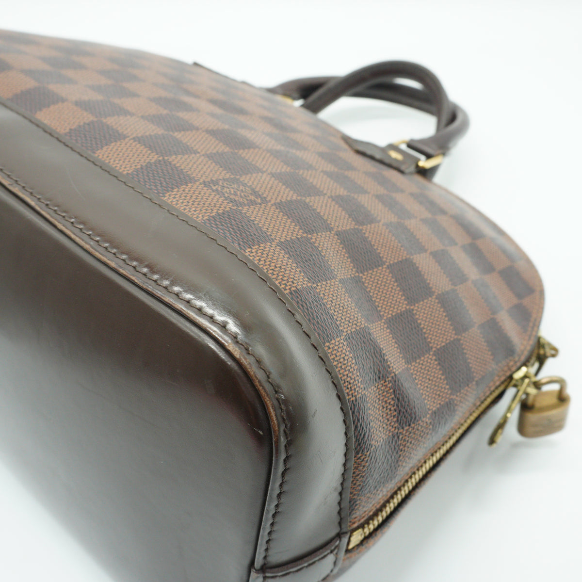 Louis Vuitton	Alma PM Damier Ebene GHW