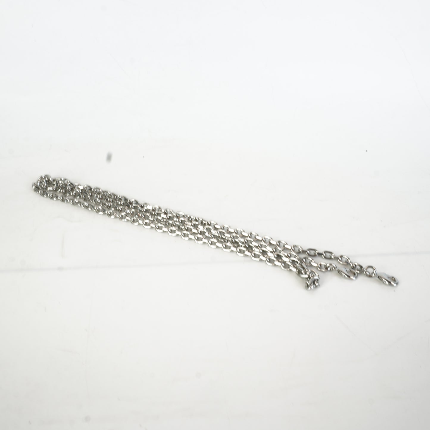 Judith Lieber	Silver Rhinestone Clutch