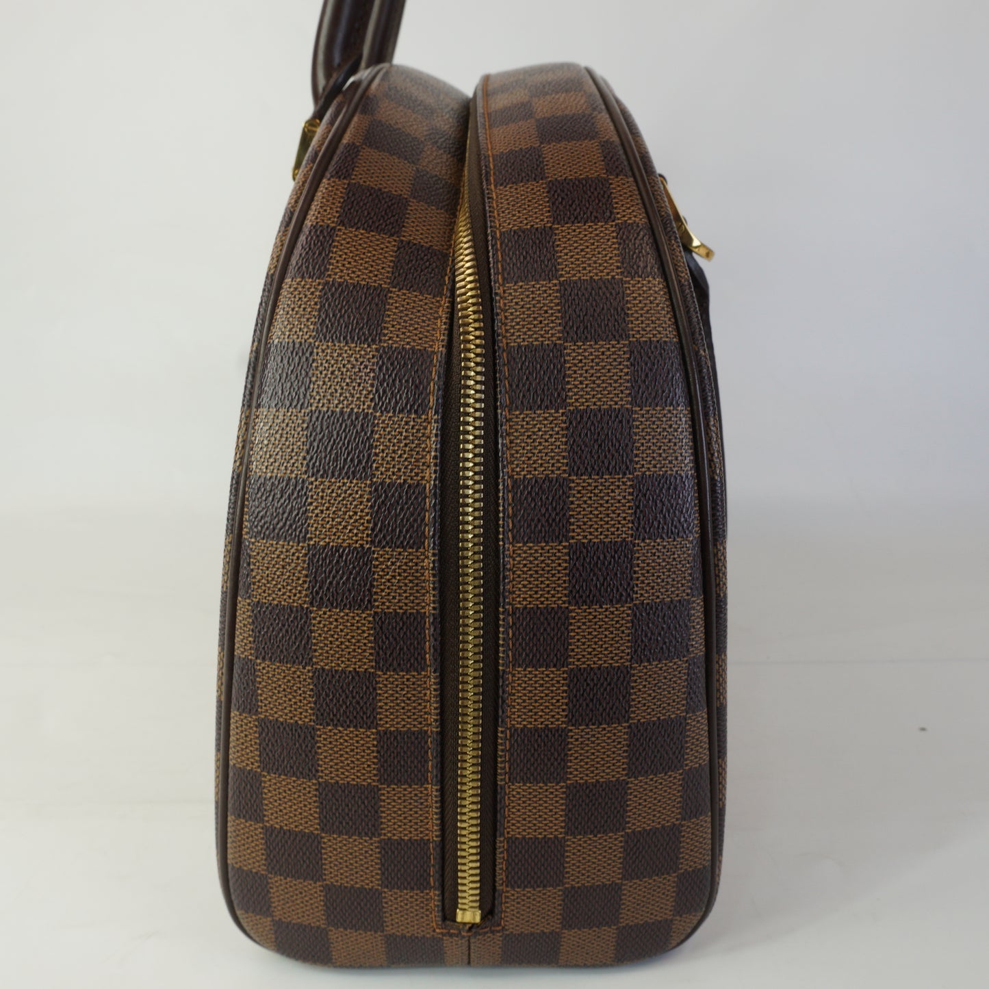 Louis Vuitton	Damier Ebene Nolita Handbag