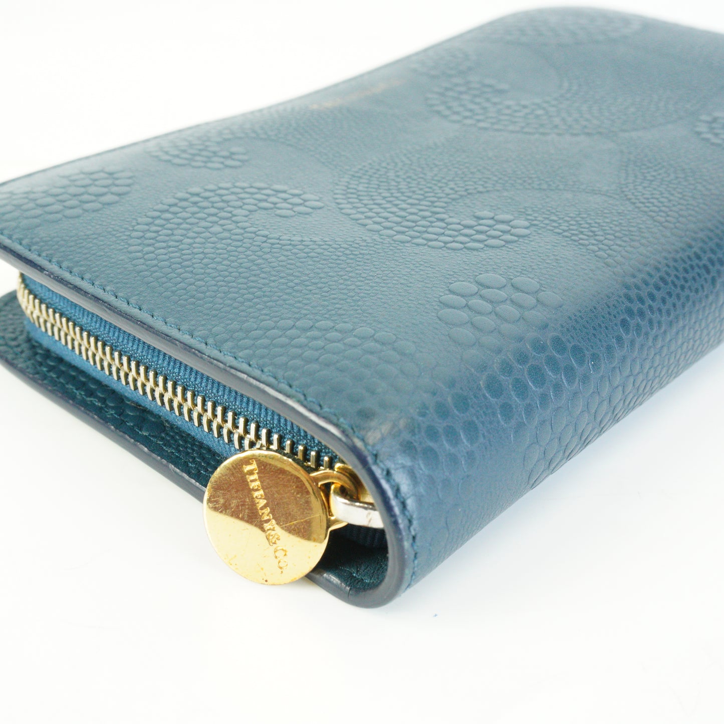 Tiffany & Co.	Wave Embossed Leather Continetal Zip Blue Wallet