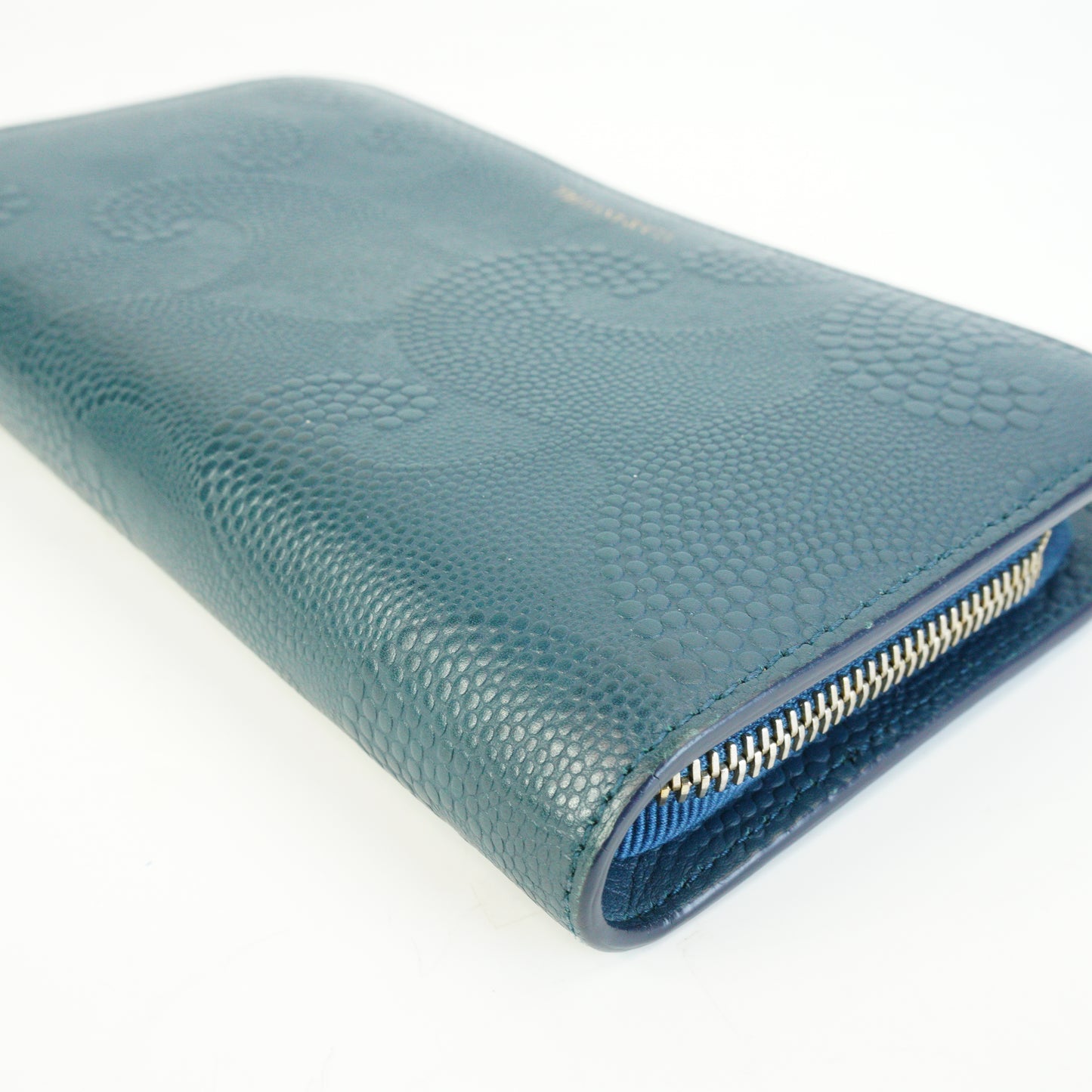 Tiffany & Co.	Wave Embossed Leather Continetal Zip Blue Wallet