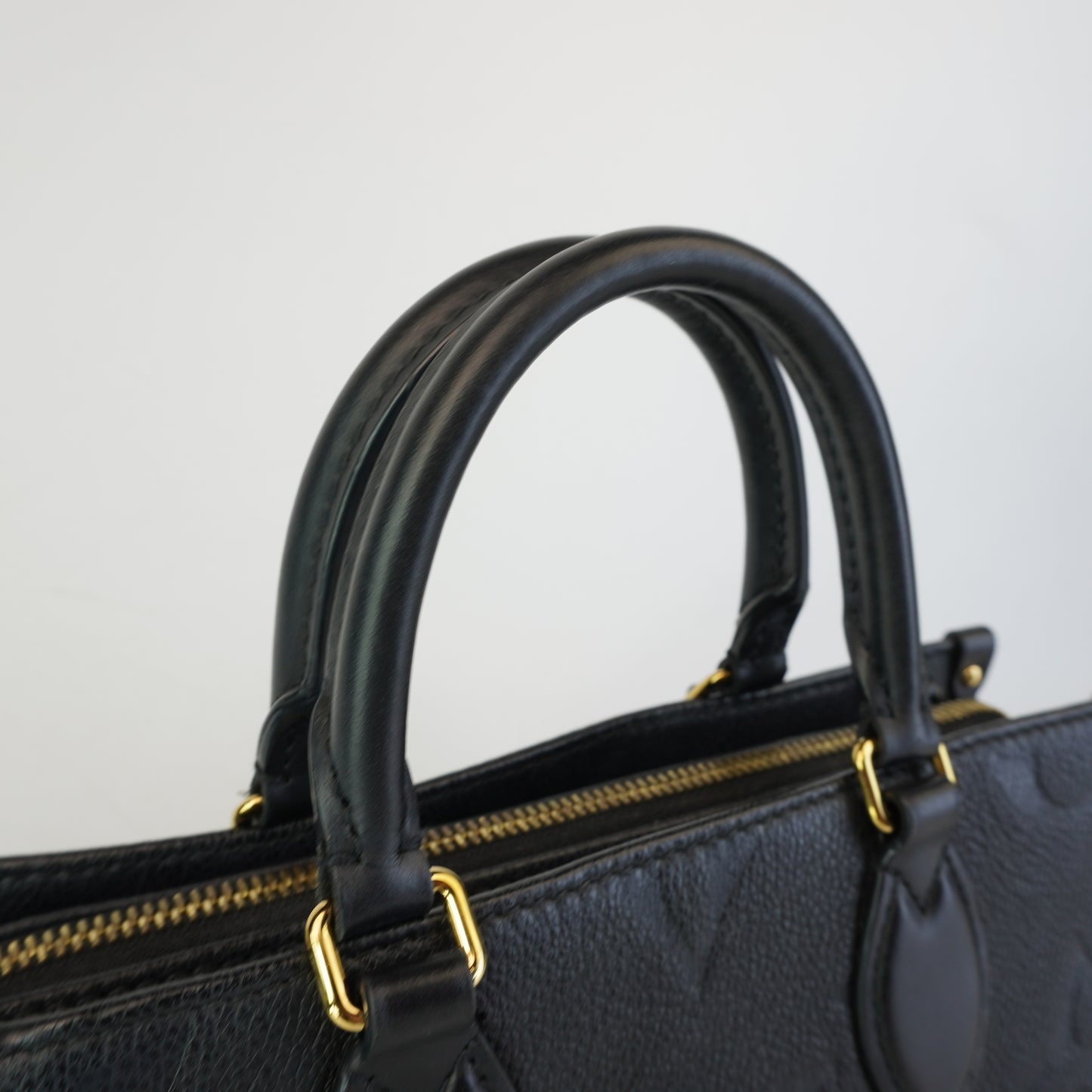 Louis Vuitton	Black Empreinte East West Mini