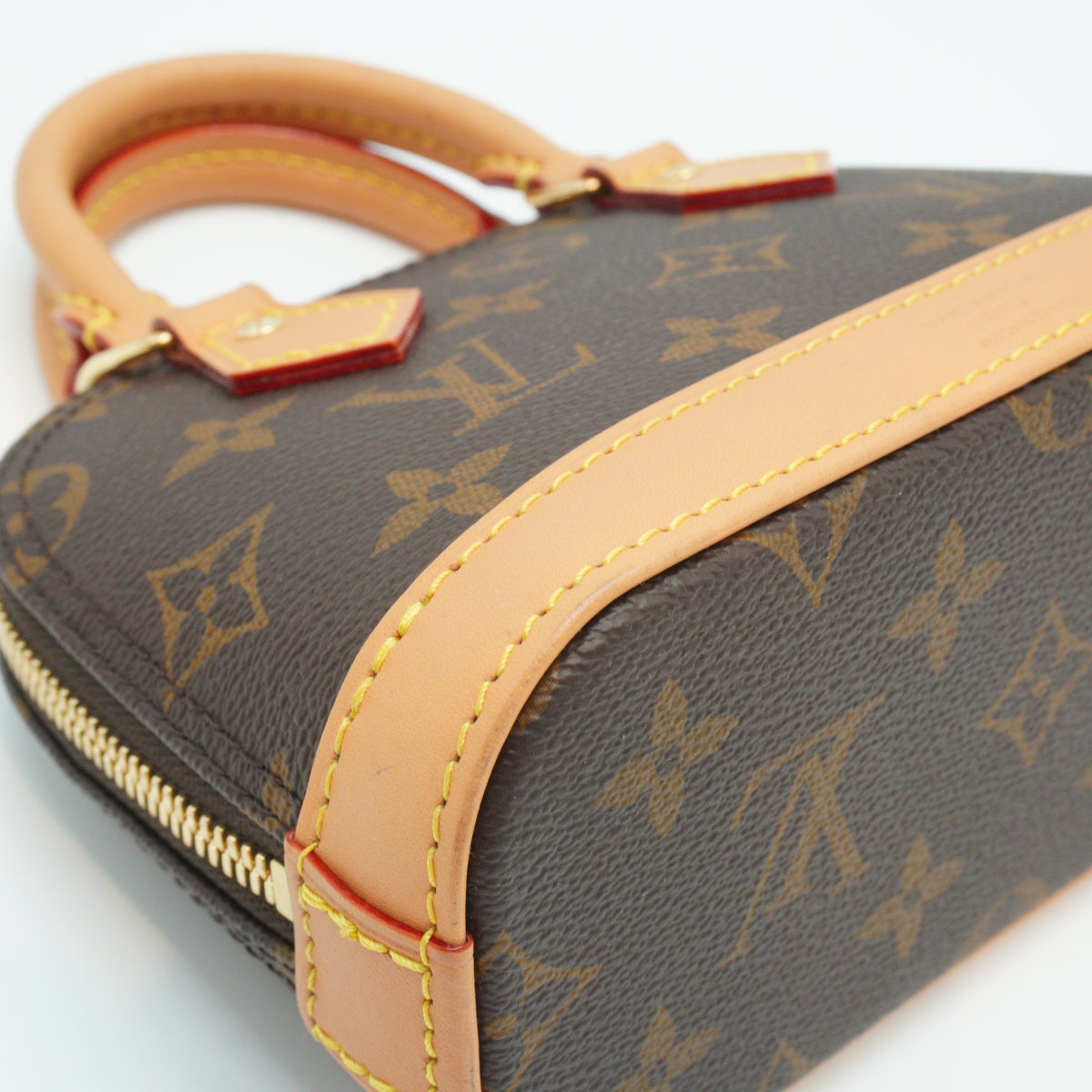 Louis Vuitton	Alma Monogram Nano GHW