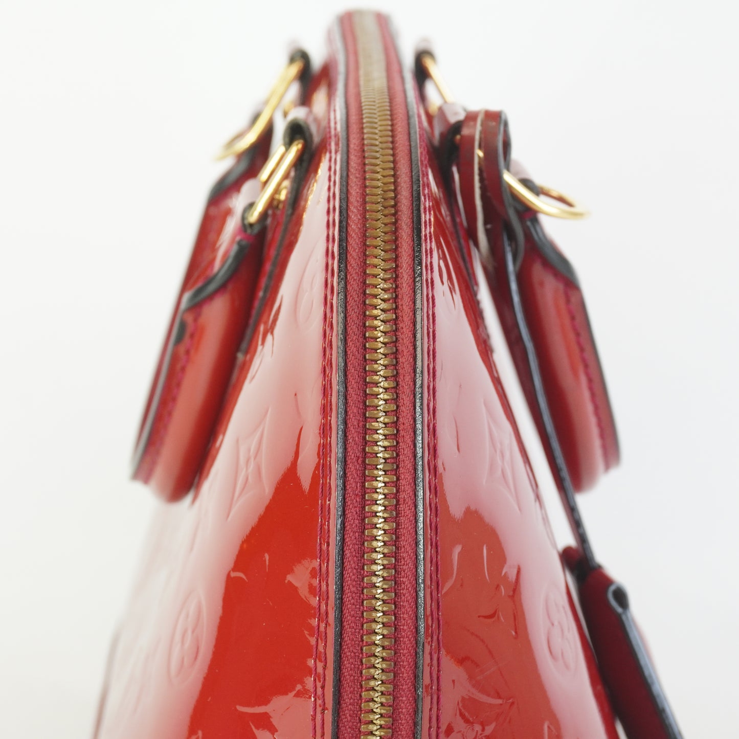 Louis Vuitton	Alma PM red