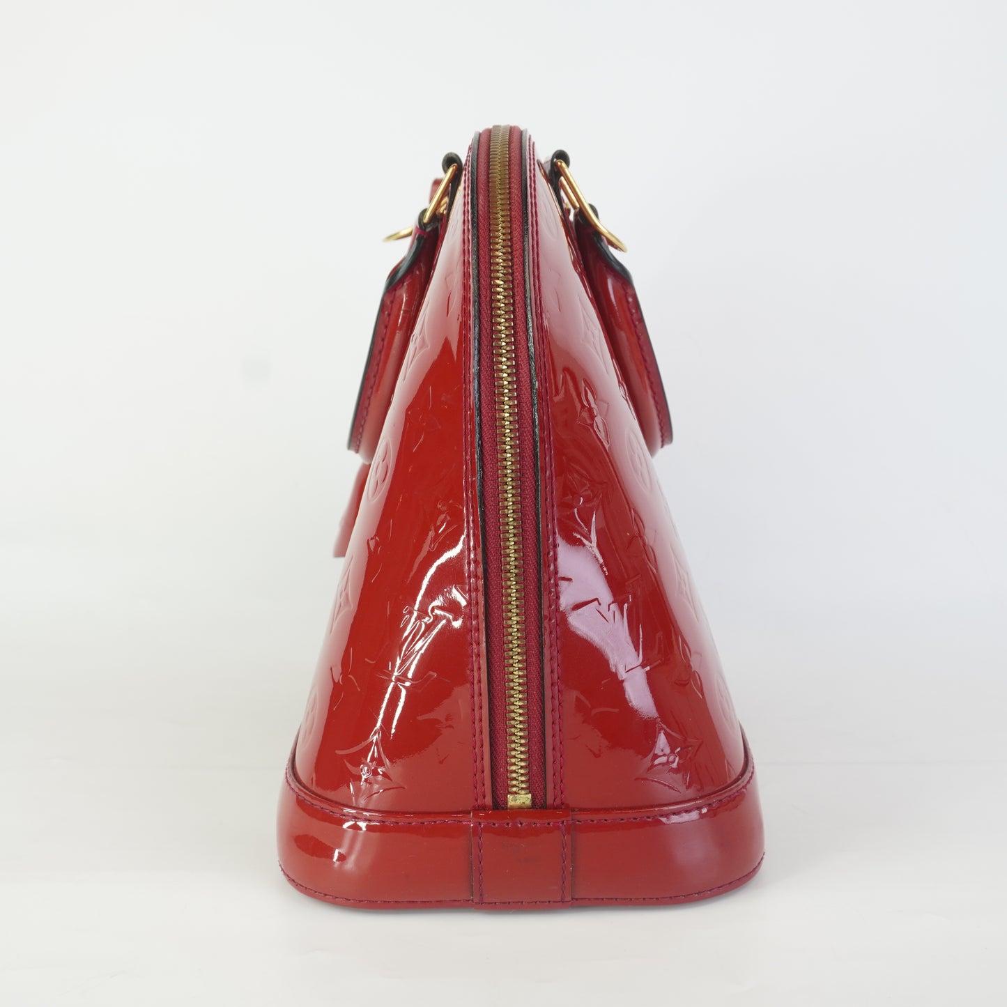 Louis Vuitton	Alma PM red