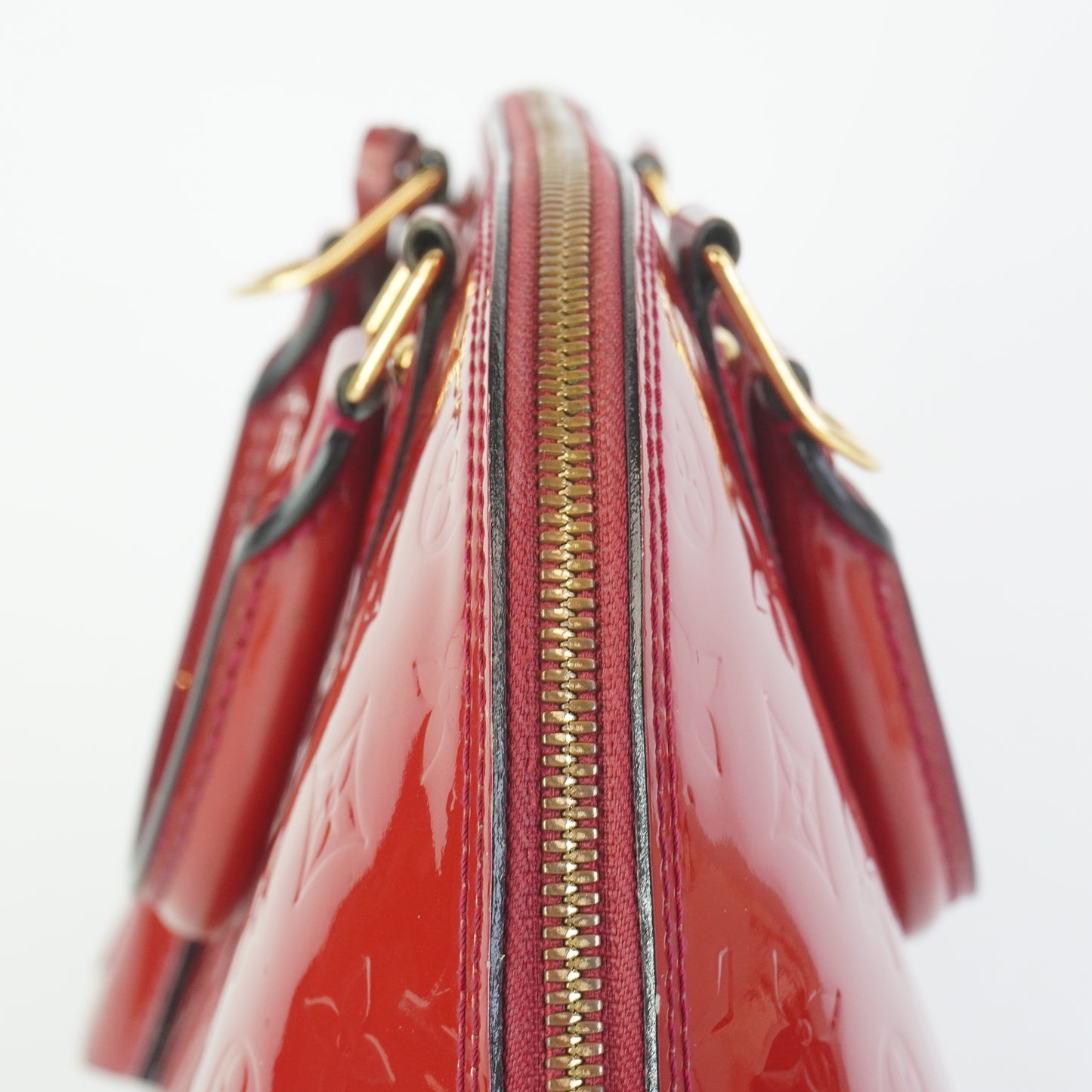 Louis Vuitton	Alma PM red