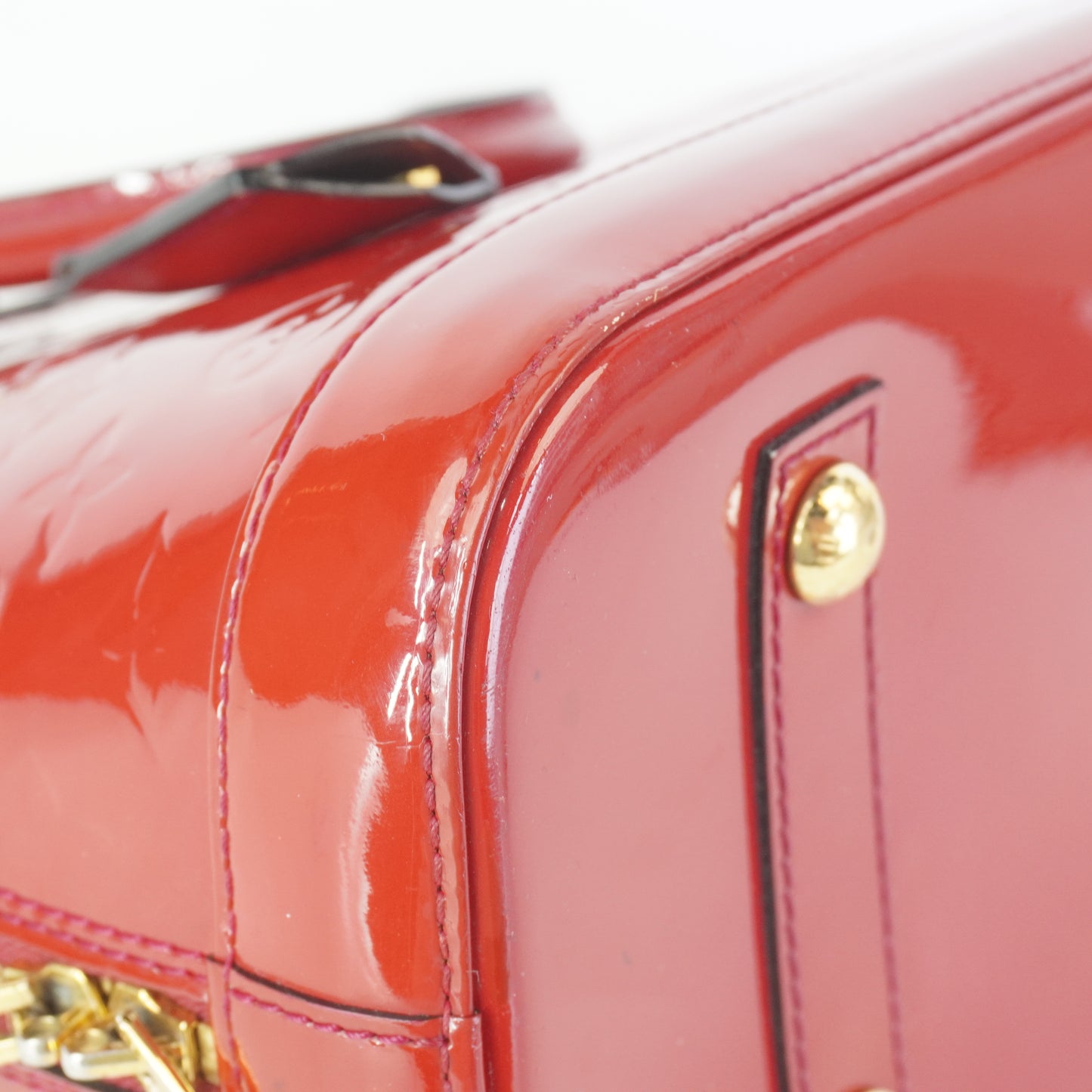 Louis Vuitton	Alma PM red