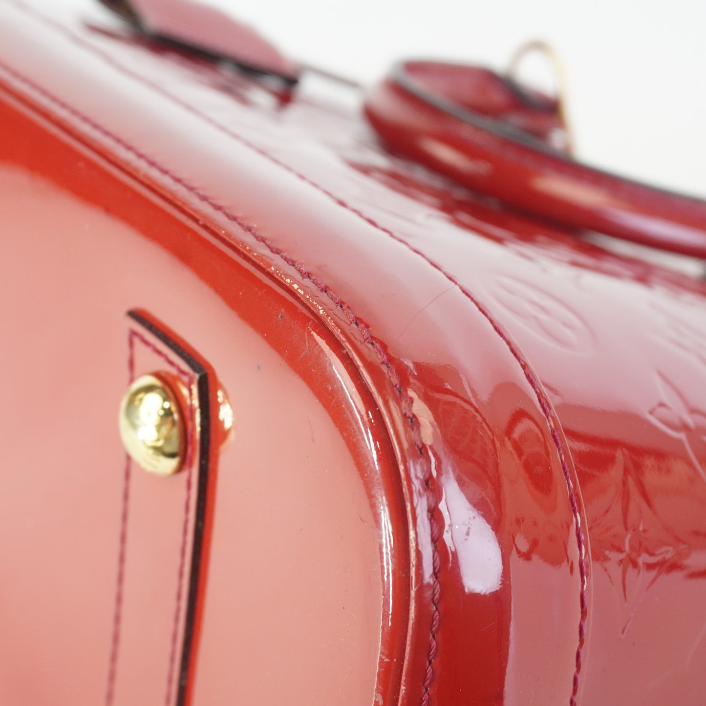 Louis Vuitton	Alma PM red