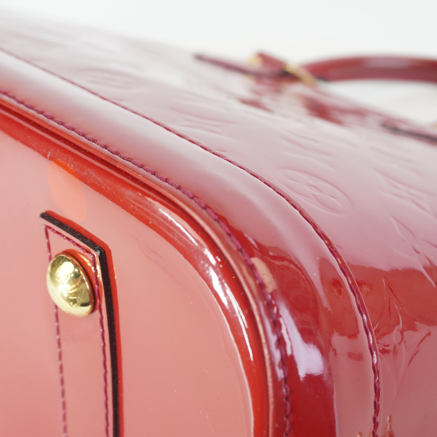 Louis Vuitton	Alma PM red