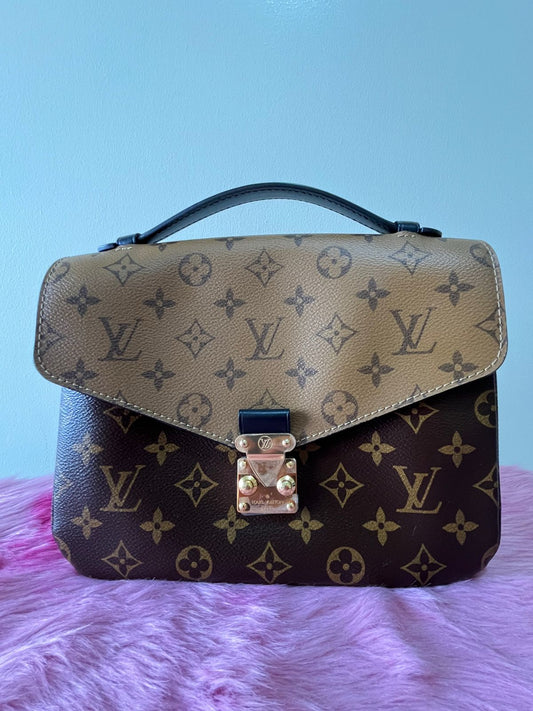 Louis Vuitton Pochette Metis Reverse Monogram Canvas – 7.5"H x 9.8"L x 2.8"W