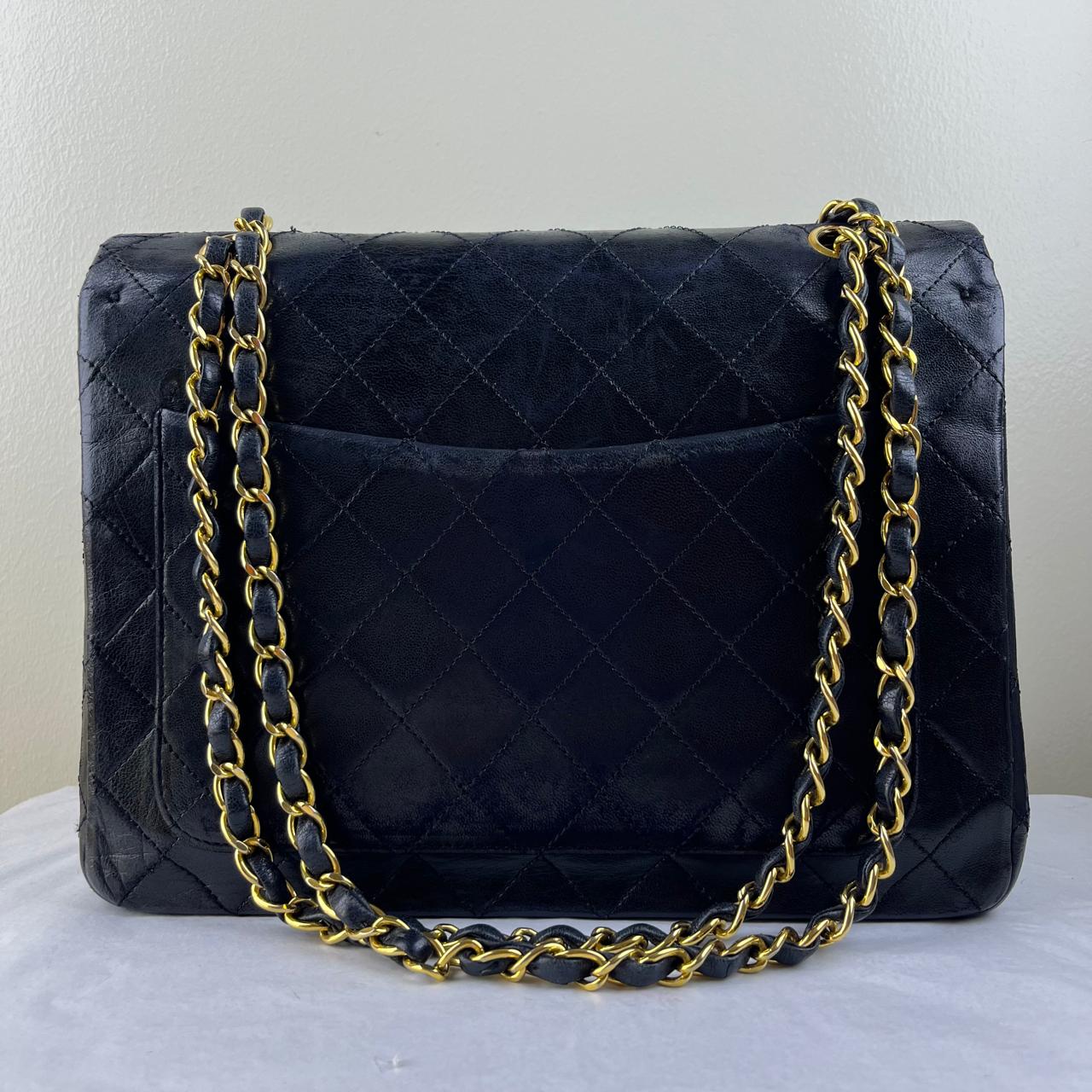 Chanel Flap Lambskin Black – 6"H x 10"L x 2.5"W