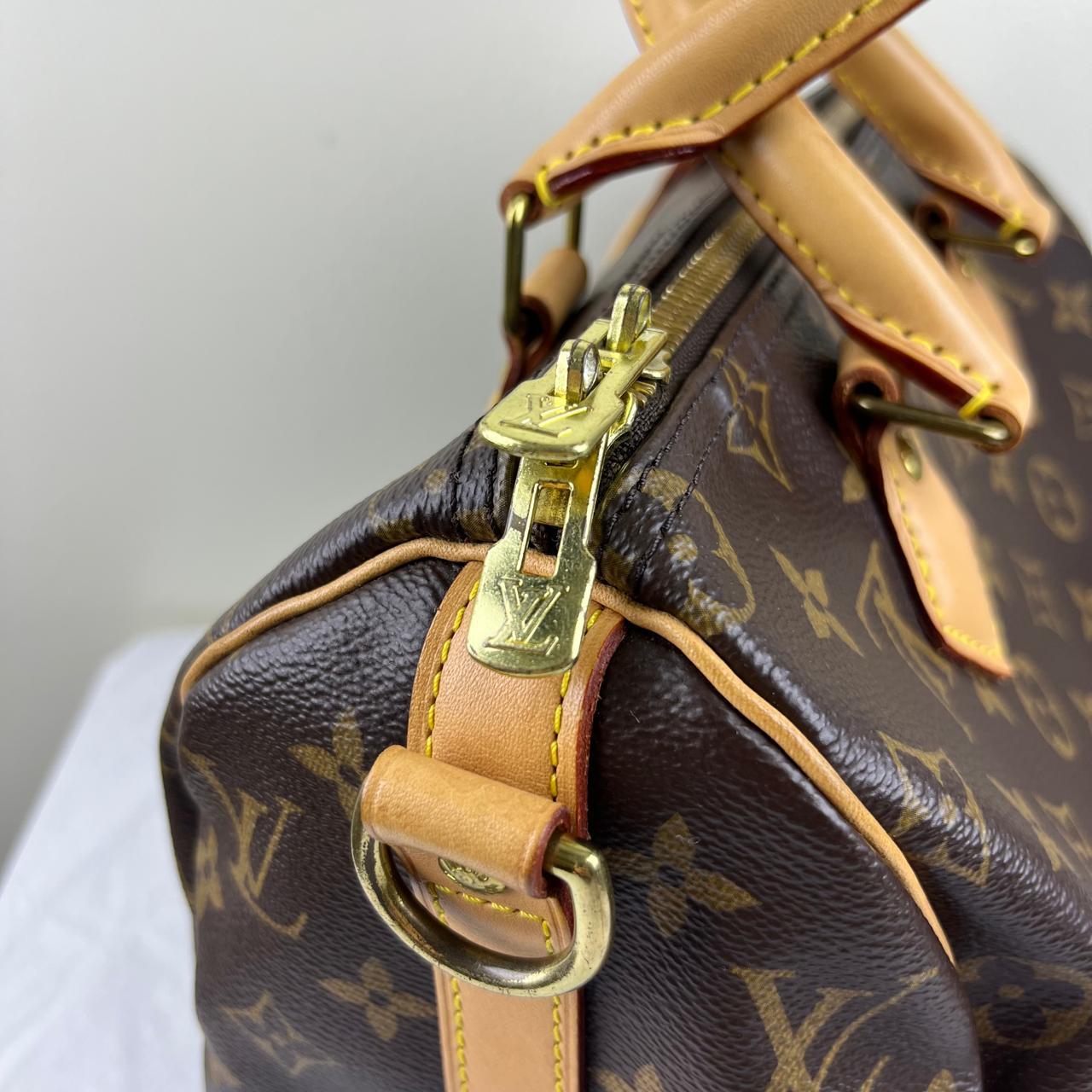 Louis Vuitton Speedy 25 Monogram Canvas – 7.5"H x 9.8"L x 5.9"W