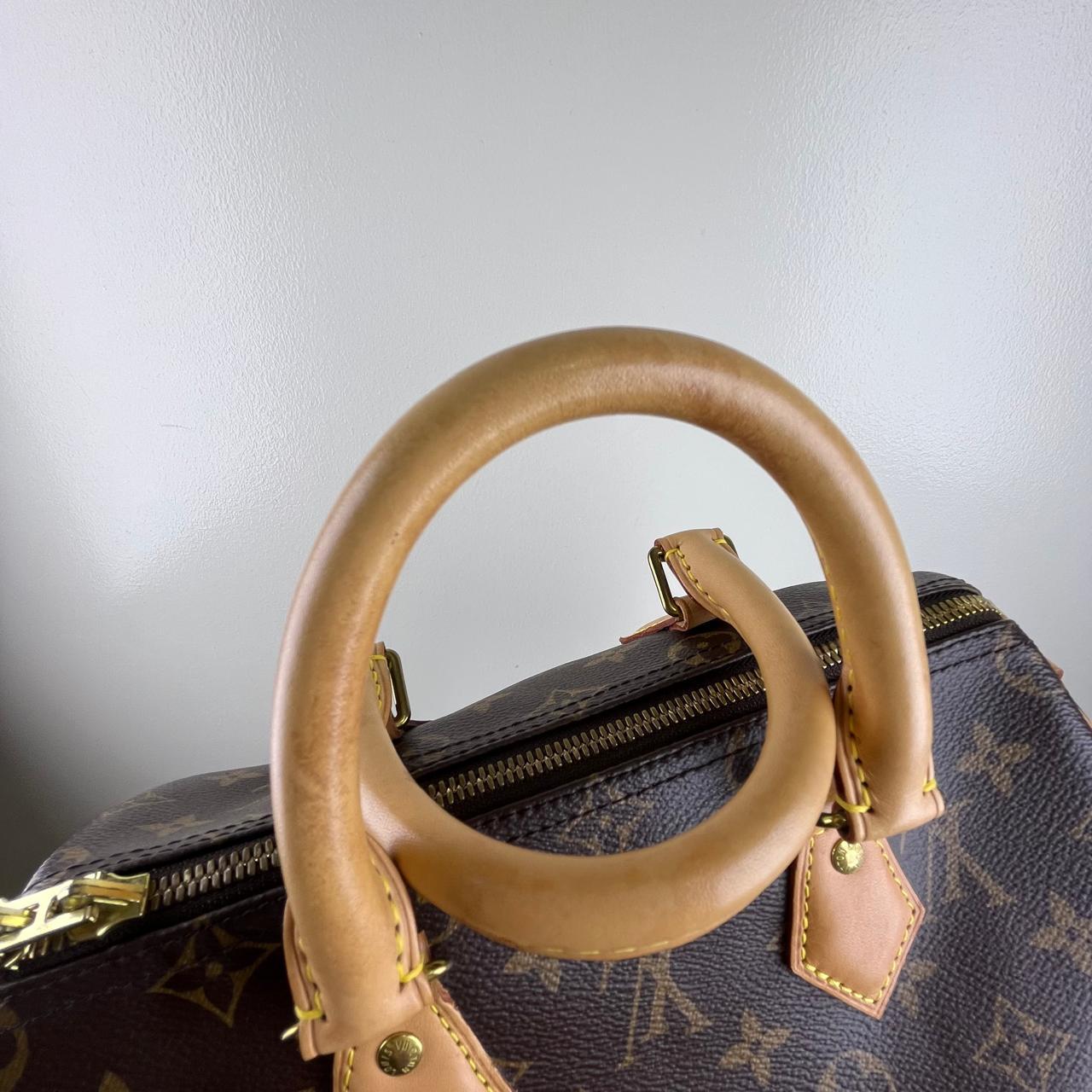 Louis Vuitton Speedy 25 Monogram Canvas – 7.5"H x 9.8"L x 5.9"W
