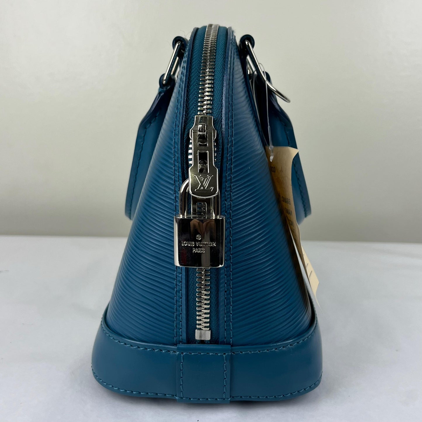 Louis Vuitton Alma BB Epi Teal – 6.7"H x 9.8"L x 4.7"W