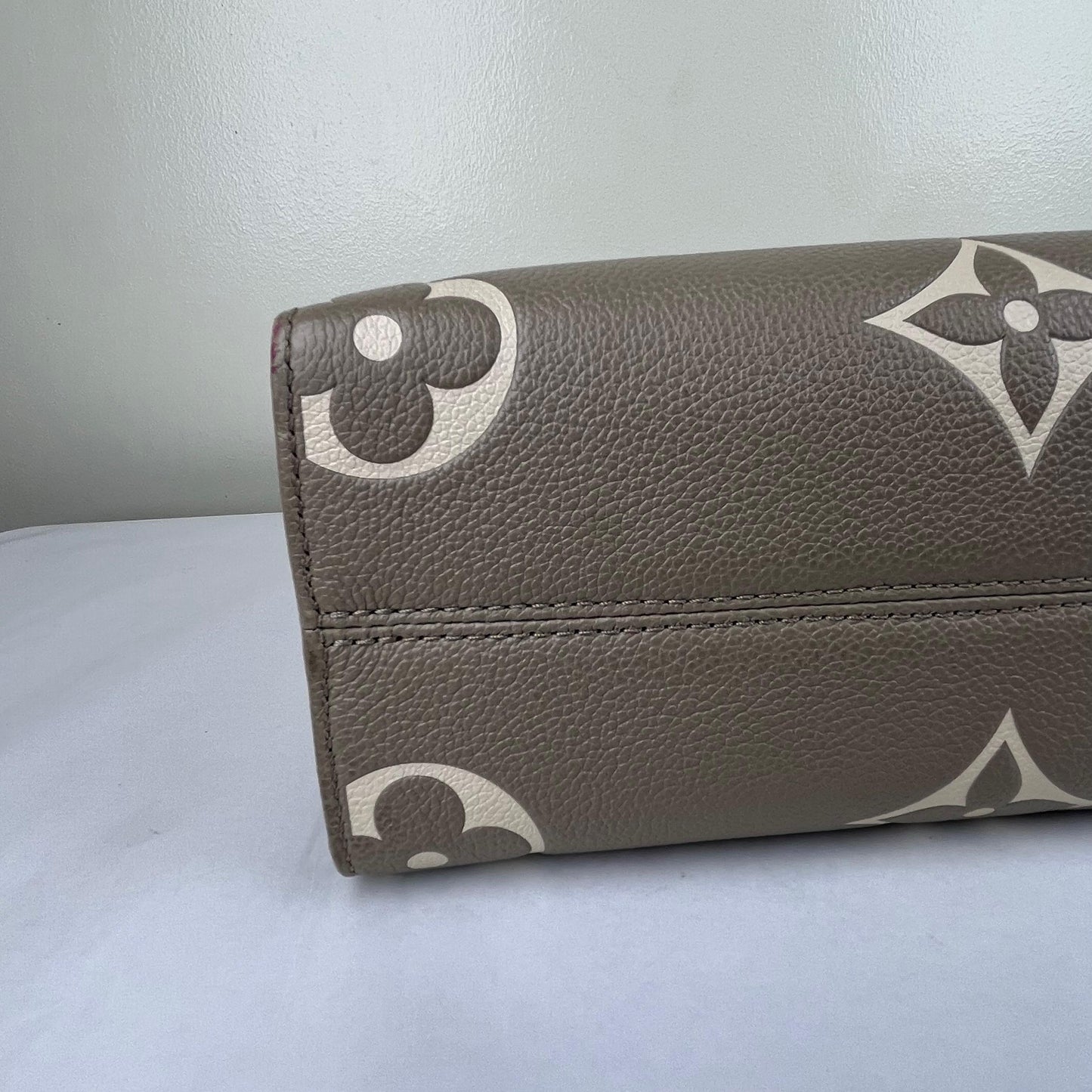 Louis Vuitton OnTheGo PM Monogram Empreinte – 6.3"H x 9.8"L x 4.7"W