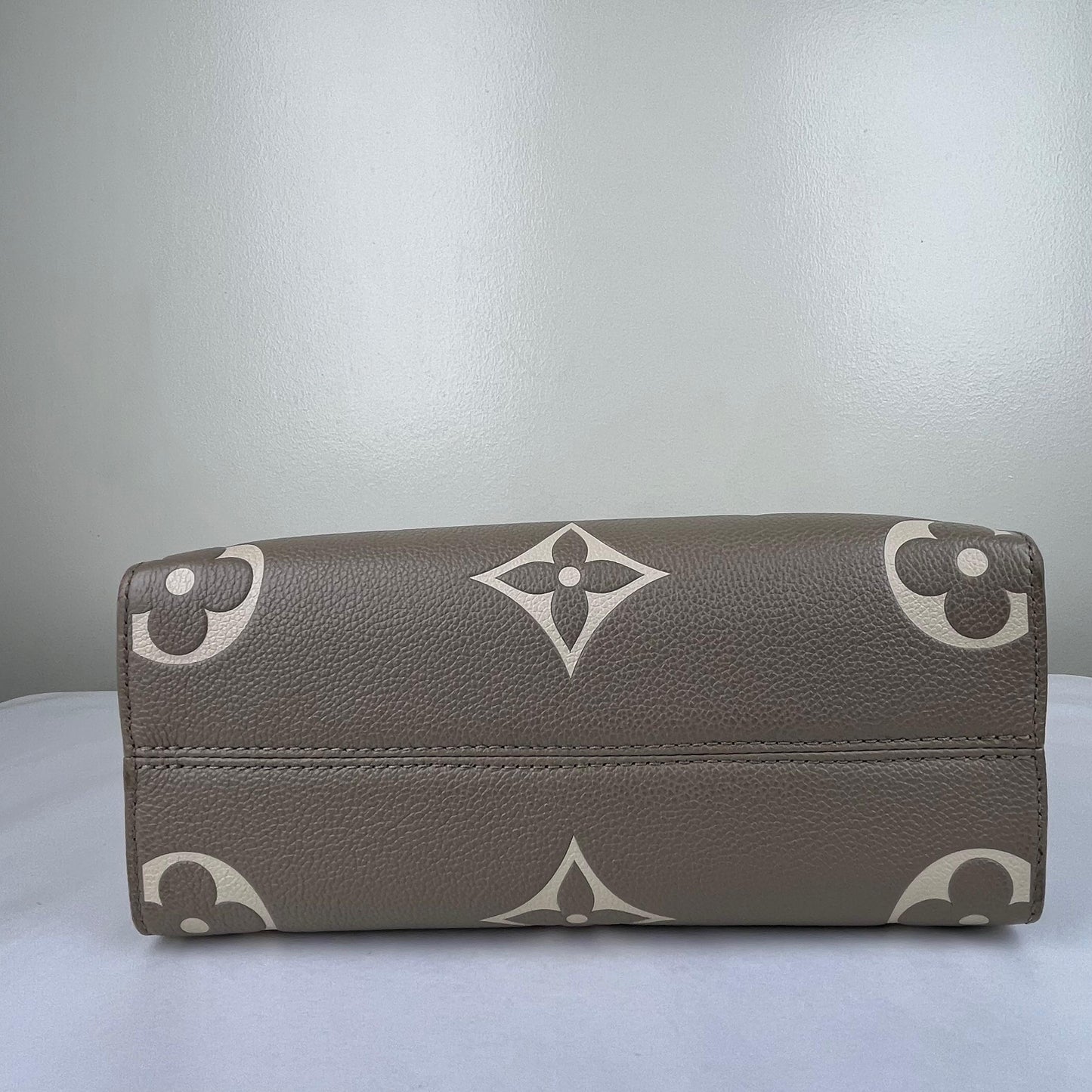 Louis Vuitton OnTheGo PM Monogram Empreinte – 6.3"H x 9.8"L x 4.7"W