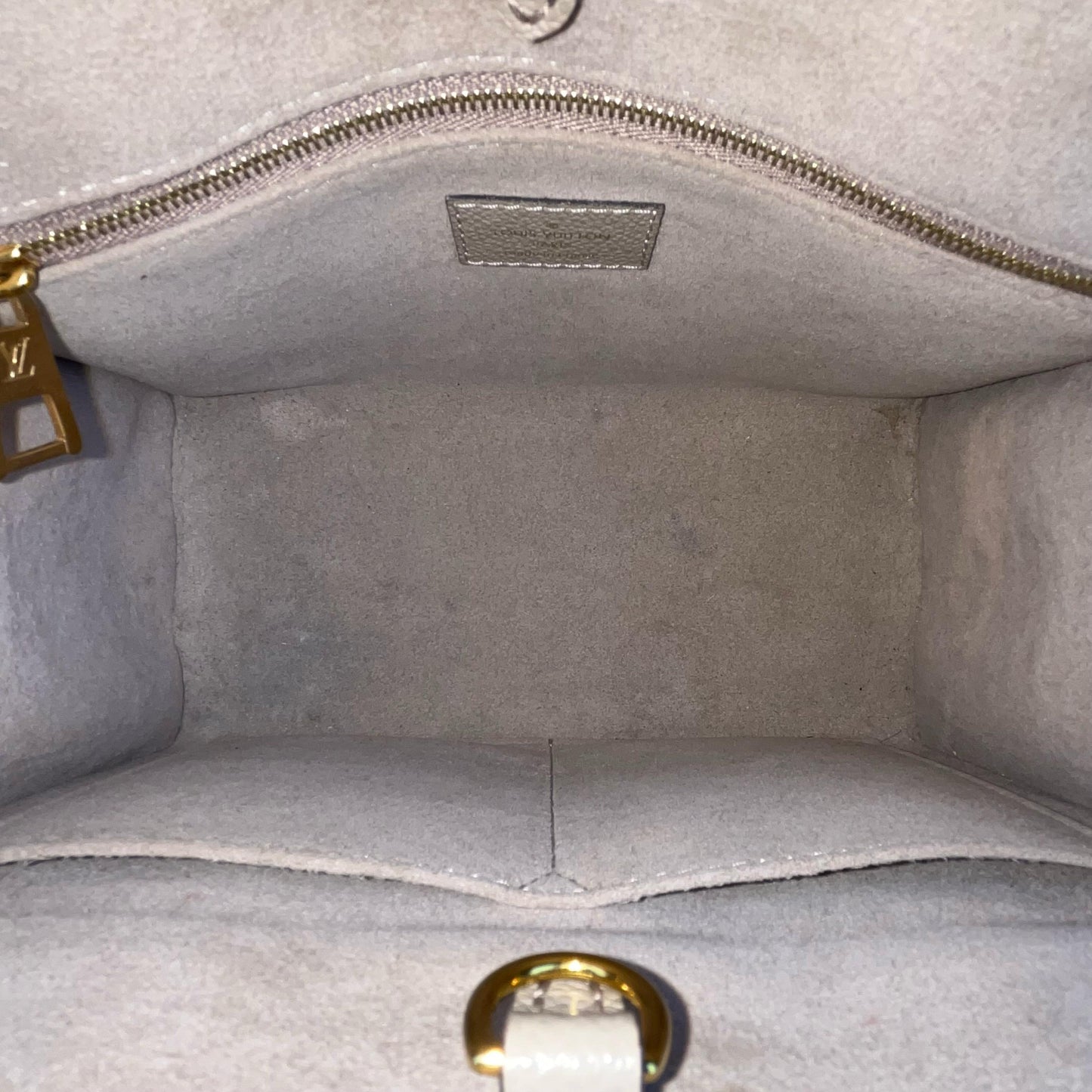 Louis Vuitton OnTheGo PM Monogram Empreinte – 6.3"H x 9.8"L x 4.7"W