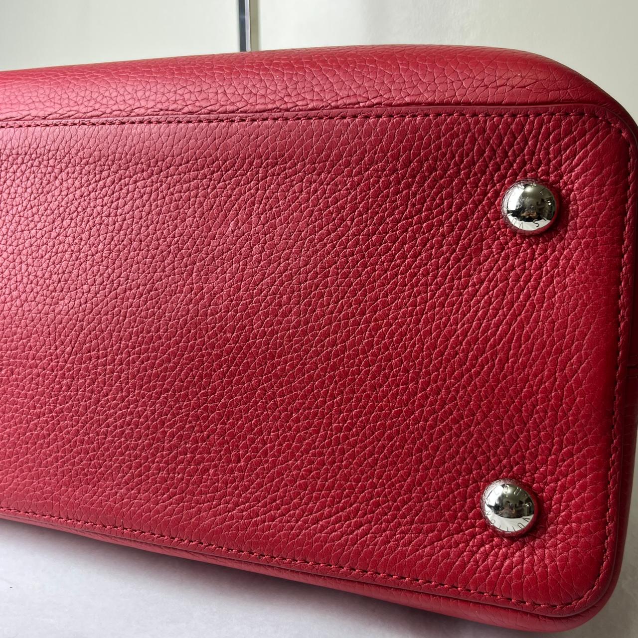 Louis Vuitton	Capucine Large Red with Snake Skin Handle