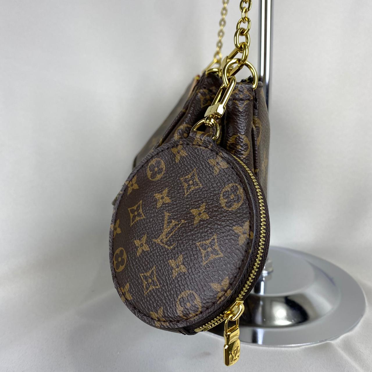 Louis Vuitton	Multi Pochette Monogram Canvas