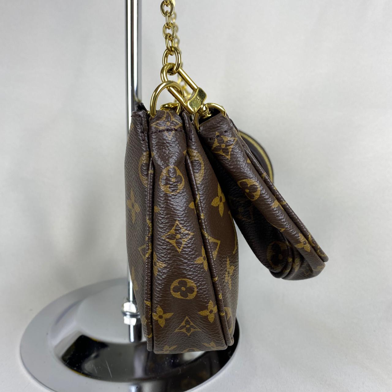 Louis Vuitton	Multi Pochette Monogram Canvas
