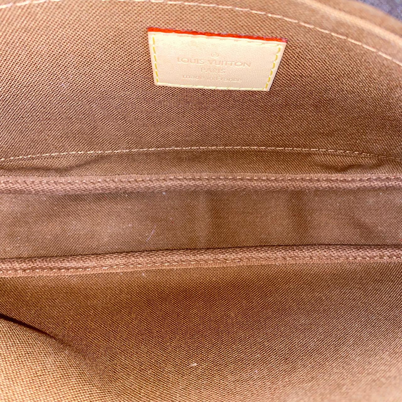 Louis Vuitton	Multi Pochette Monogram Canvas