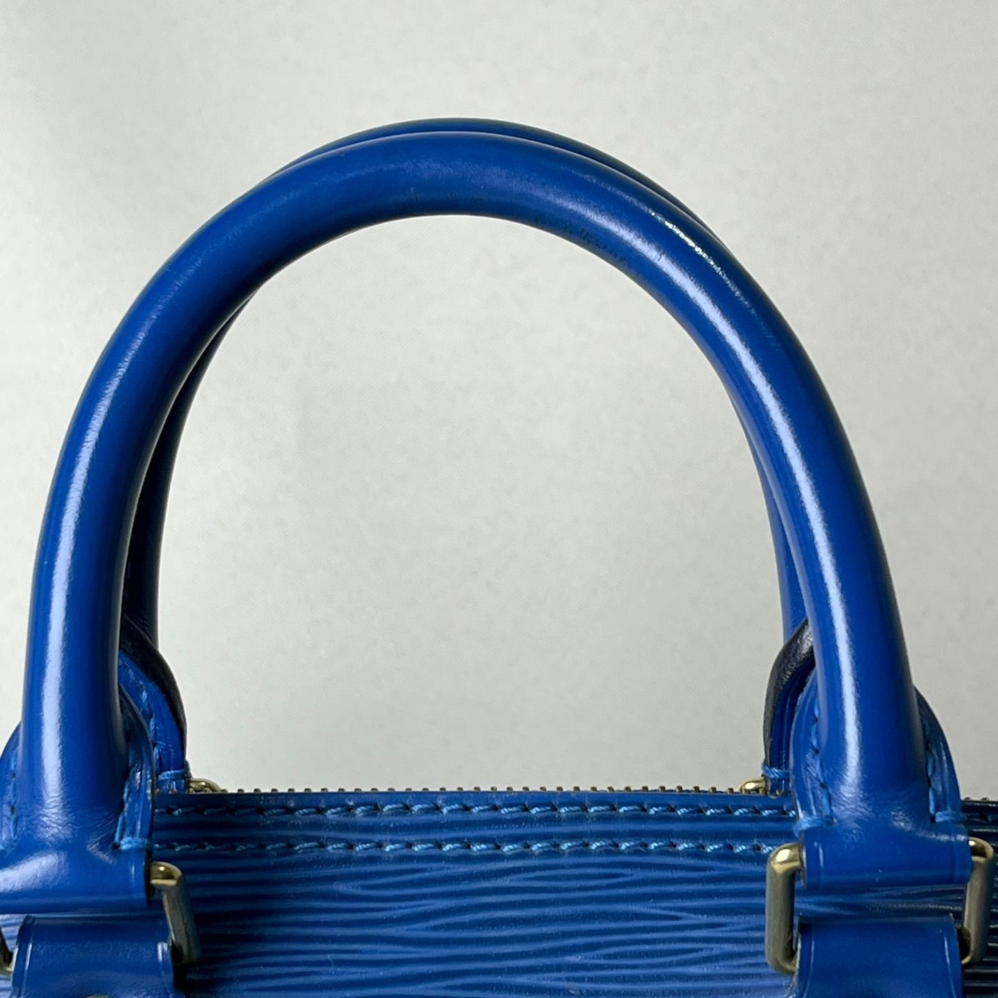 Louis Vuitton	Speedy 25 Epi Blue