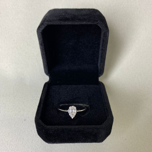 Ring 0.20 carat white gold ring round brilliant baguette