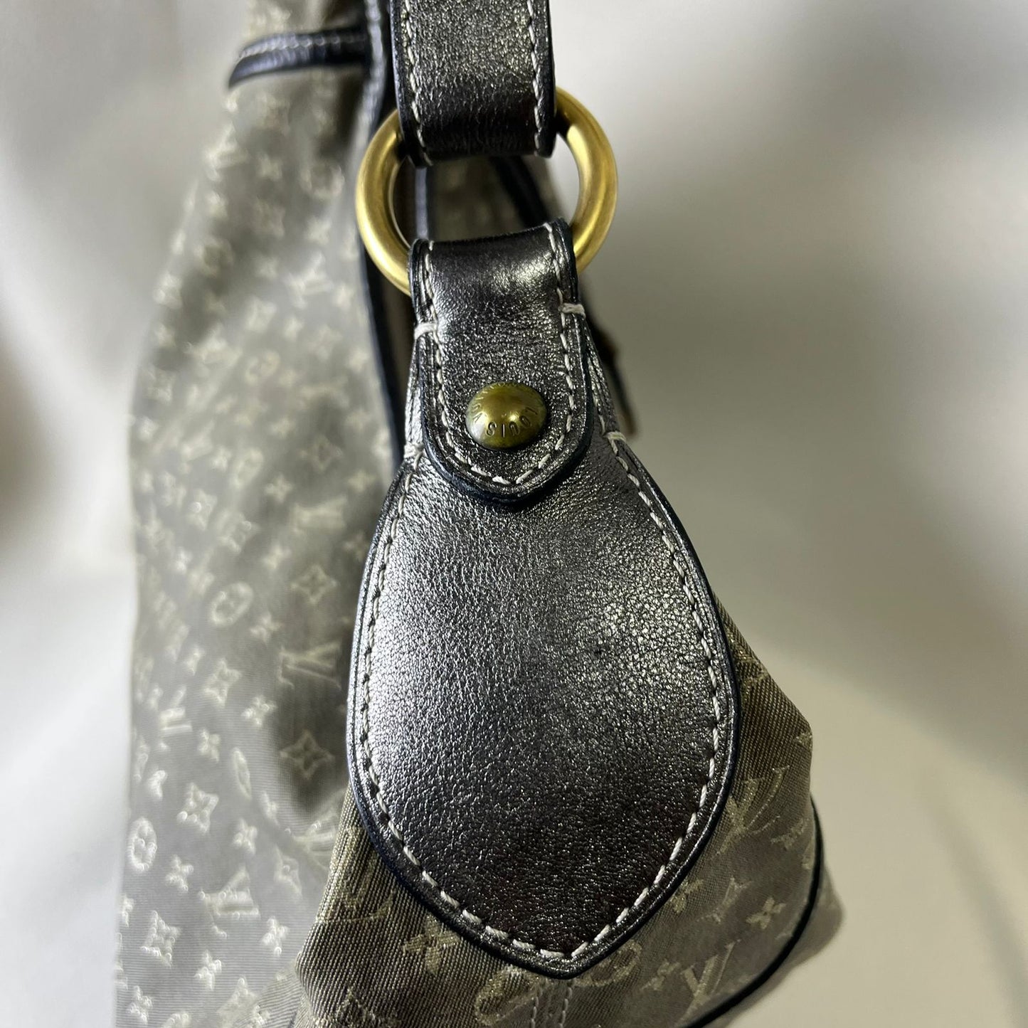 Louis Vuitton	Mini Lin Manon MM Grey Metallic Leather Trim