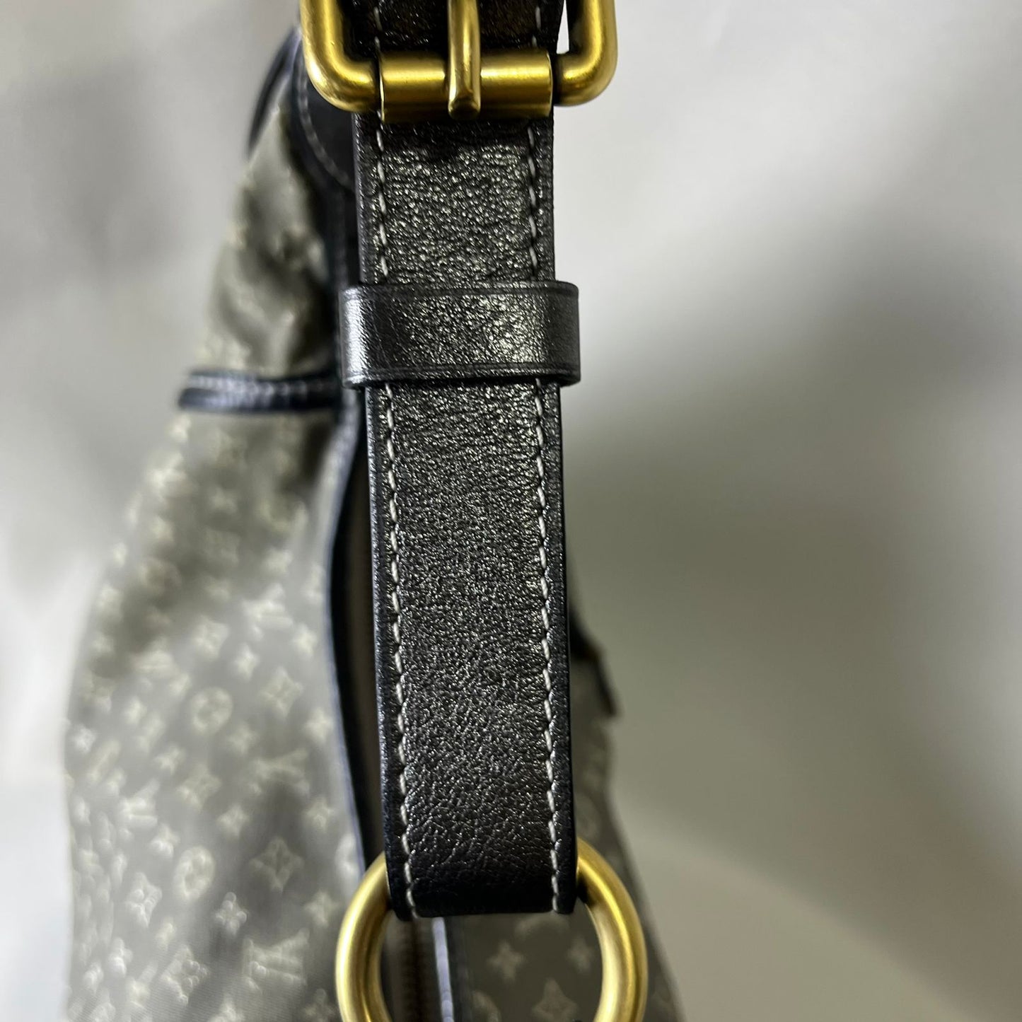 Louis Vuitton	Mini Lin Manon MM Grey Metallic Leather Trim
