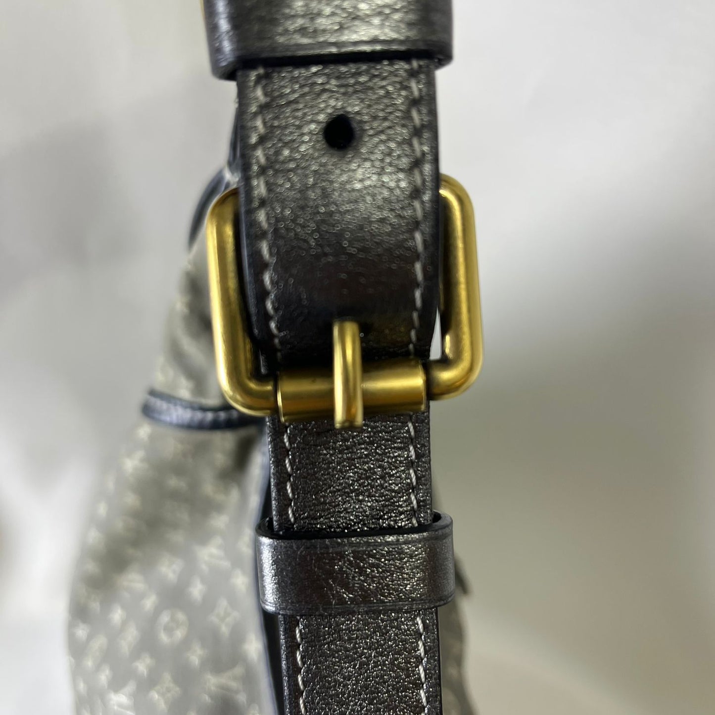 Louis Vuitton	Mini Lin Manon MM Grey Metallic Leather Trim