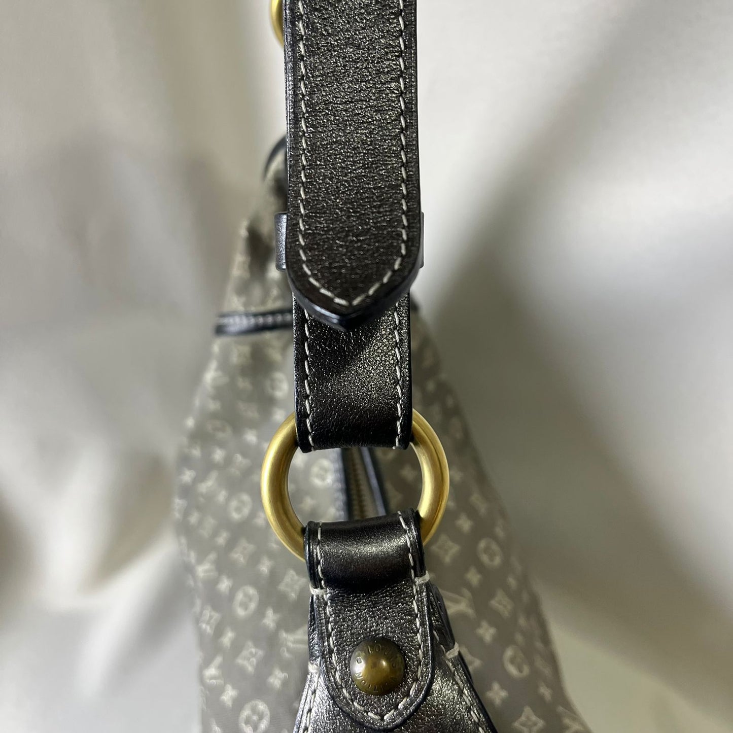 Louis Vuitton	Mini Lin Manon MM Grey Metallic Leather Trim