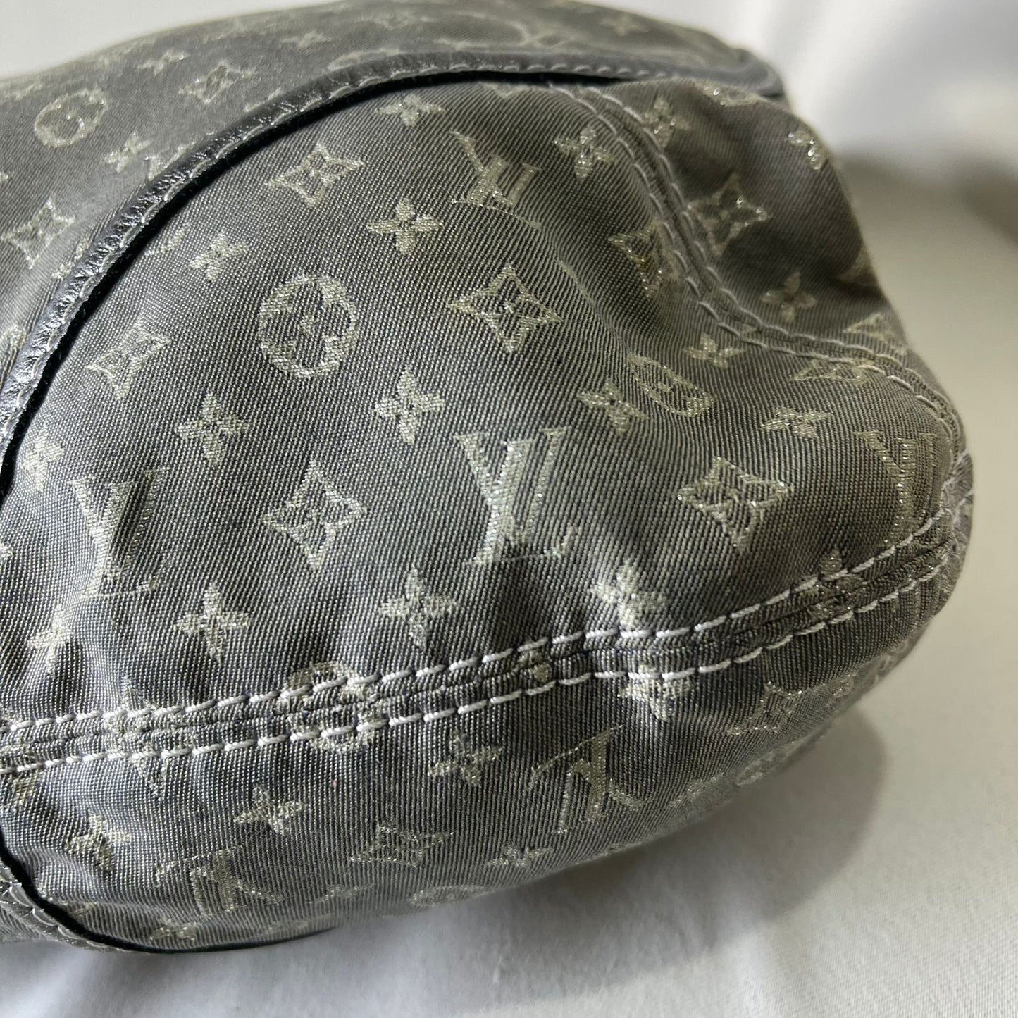 Louis Vuitton	Mini Lin Manon MM Grey Metallic Leather Trim