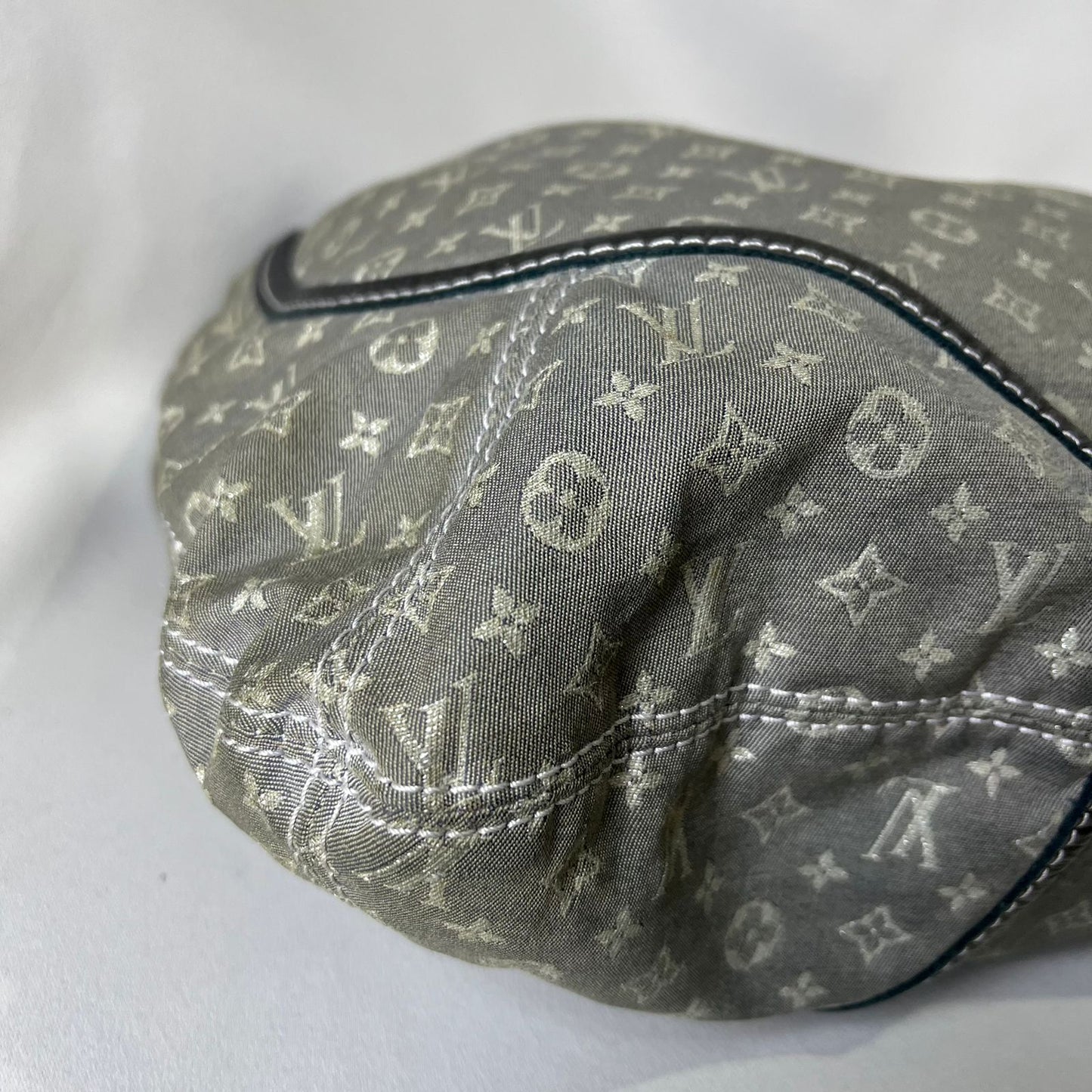 Louis Vuitton	Mini Lin Manon MM Grey Metallic Leather Trim