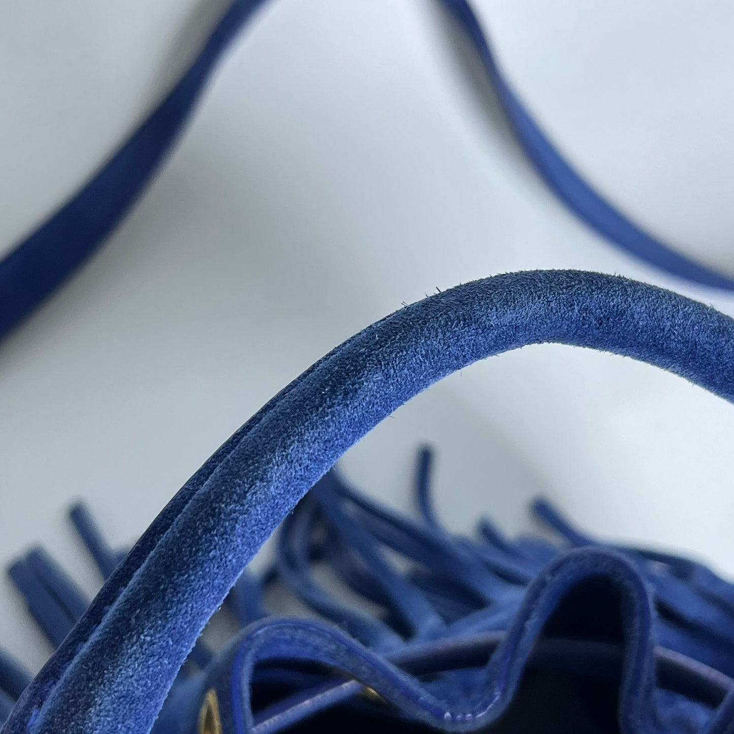 YSL	Emmanuelle Fringe Bucket Blue Suede