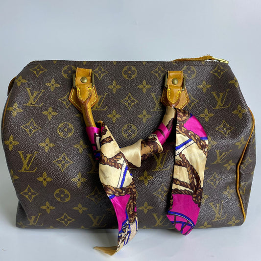 Louis Vuitton	Speedy 30 Monogram Canvas