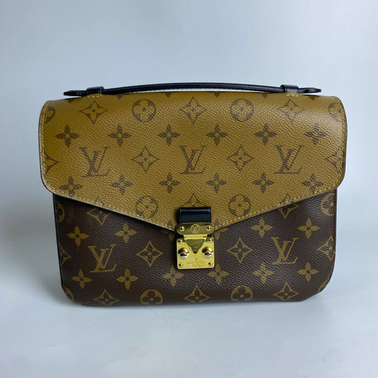 Louis Vuitton	Pochette Metis Reverse Monogram Canvas