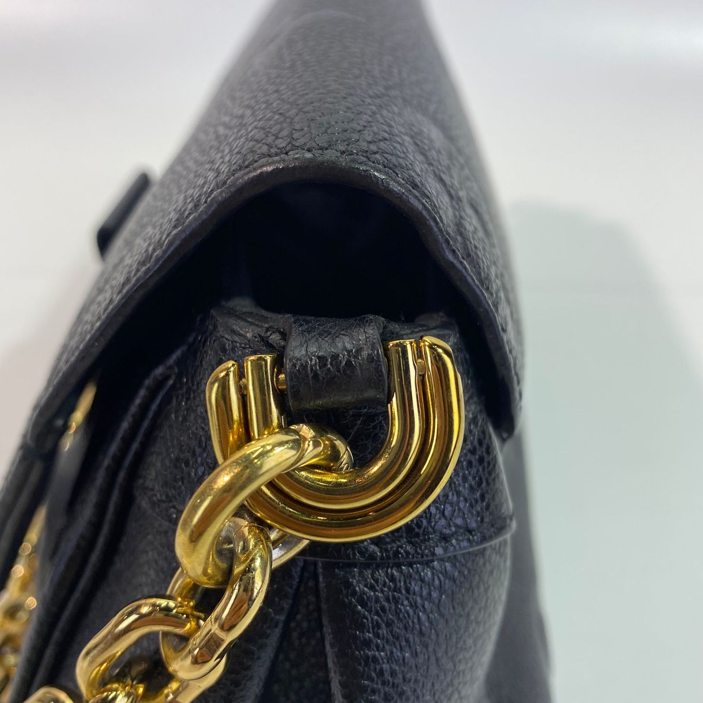 Louis Vuitton	Favorite Black Monogram Empreinte GHW