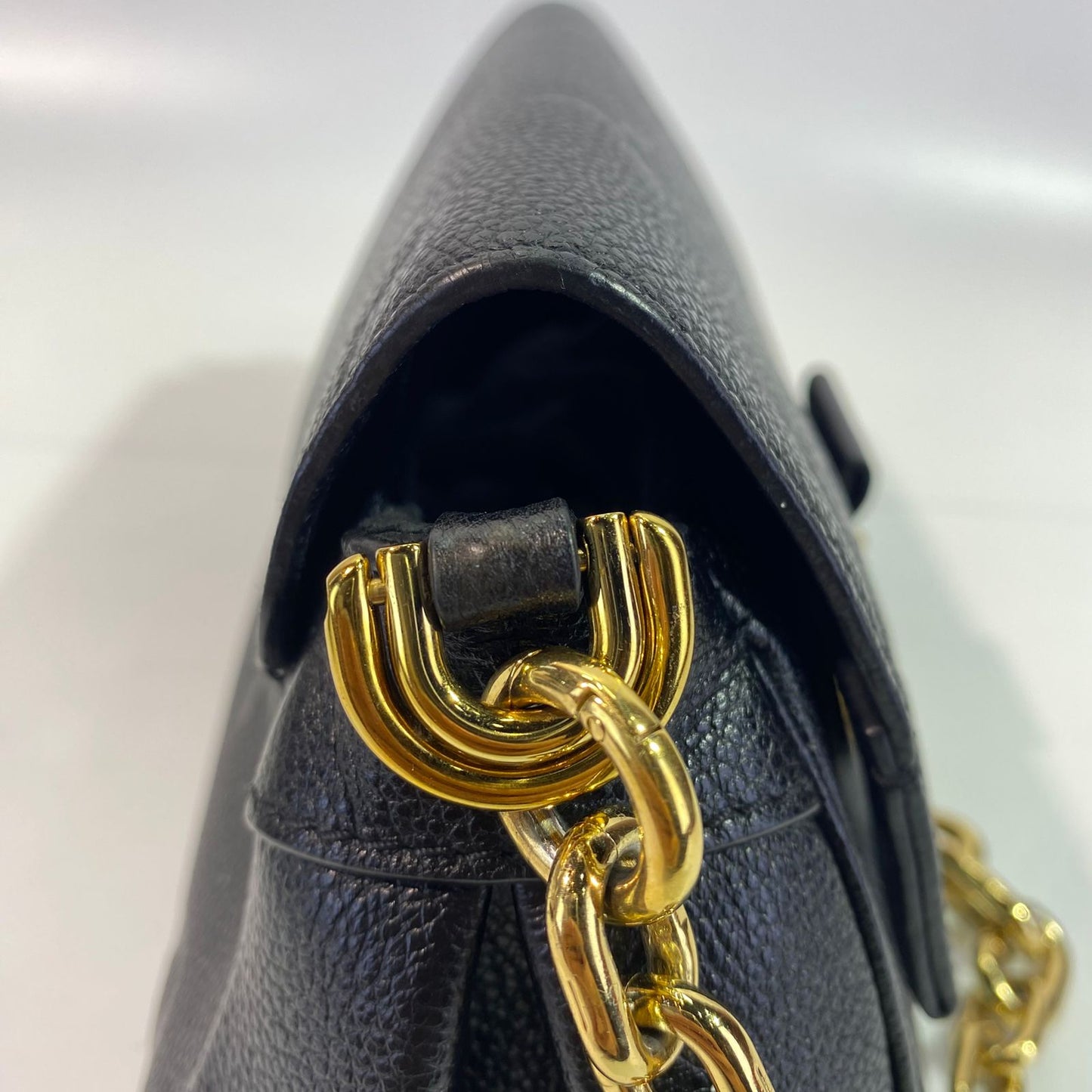 Louis Vuitton	Favorite Black Monogram Empreinte GHW
