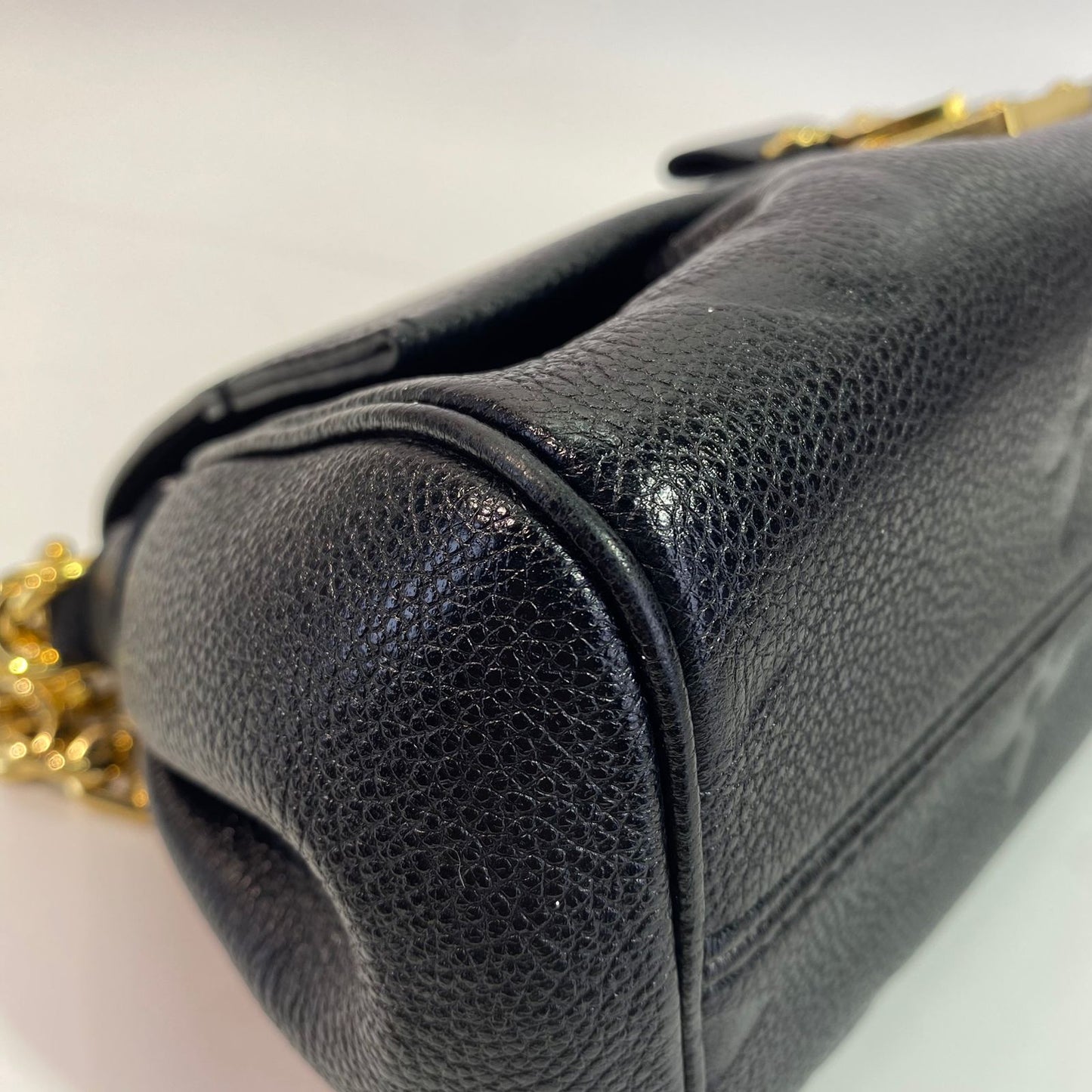 Louis Vuitton	Favorite Black Monogram Empreinte GHW
