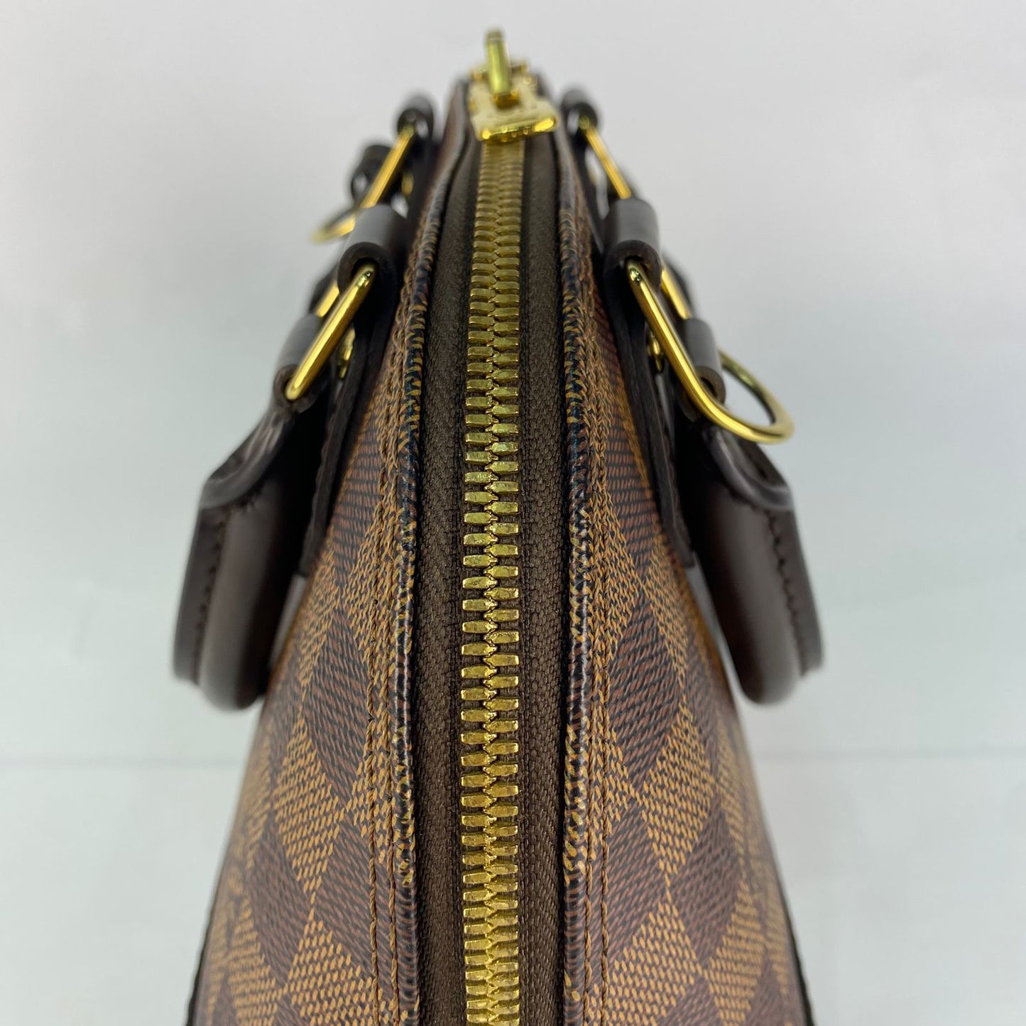 Louis Vuitton	Alma BB Damier Ebene