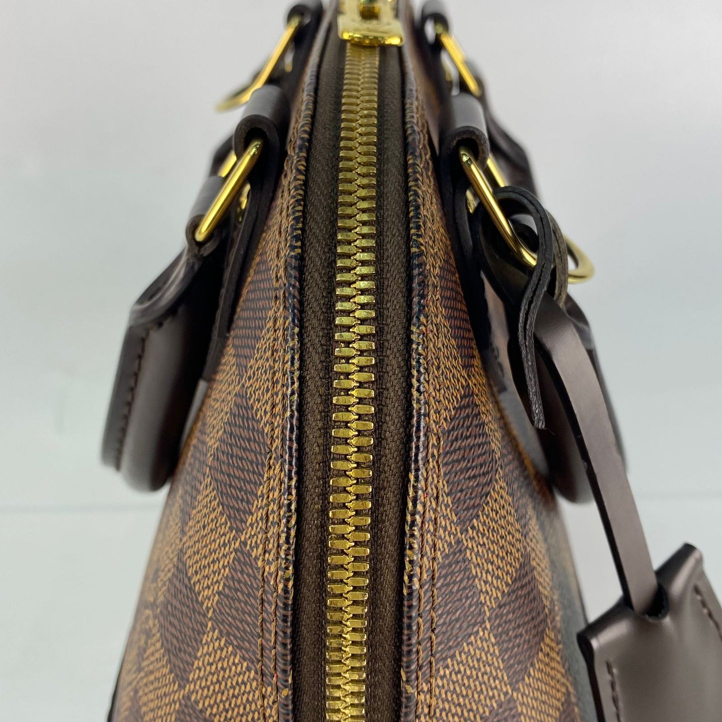 Louis Vuitton	Alma BB Damier Ebene