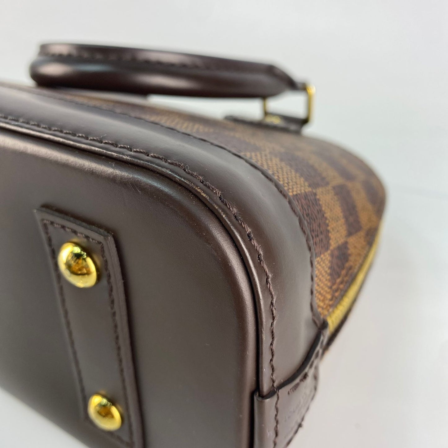 Louis Vuitton	Alma BB Damier Ebene