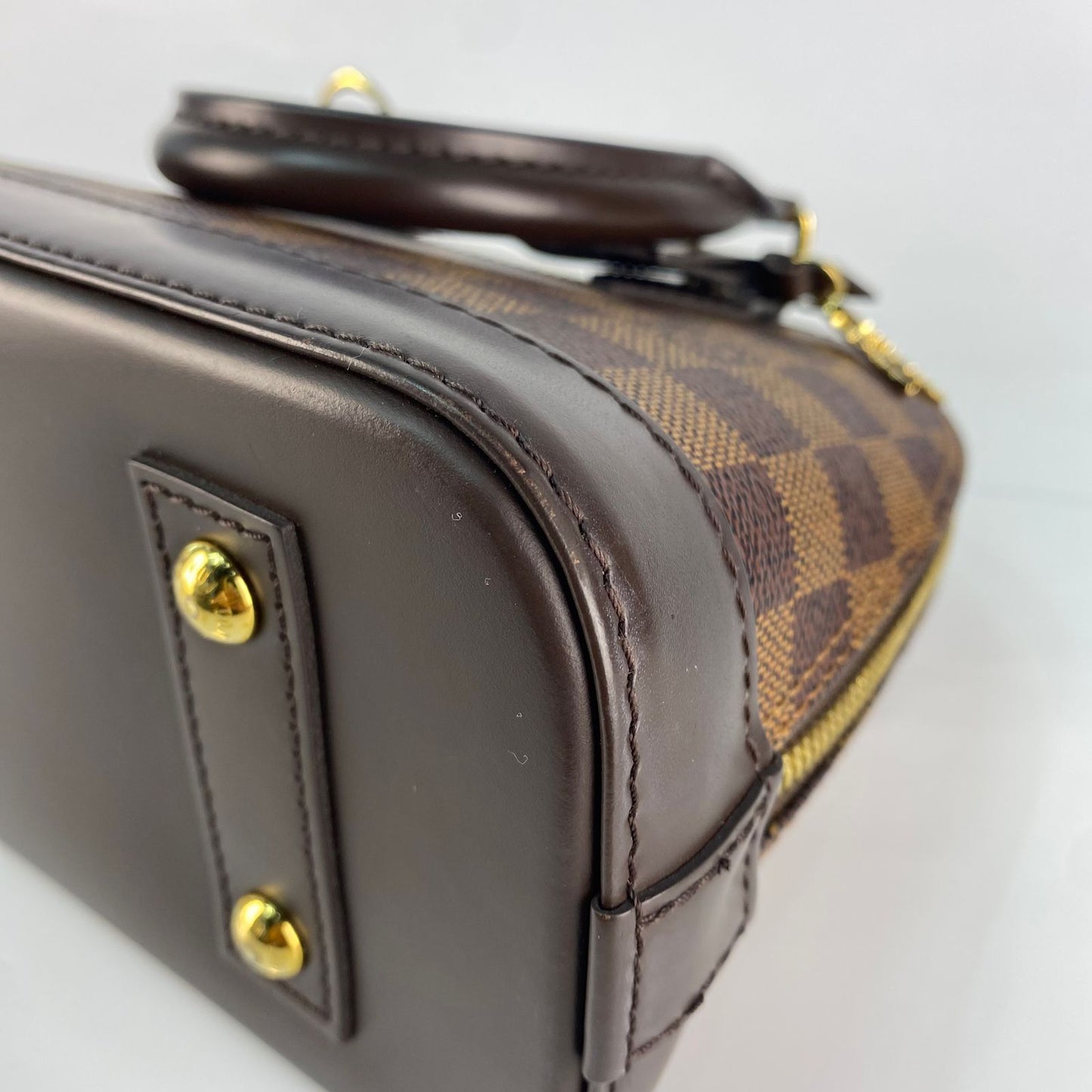 Louis Vuitton	Alma BB Damier Ebene