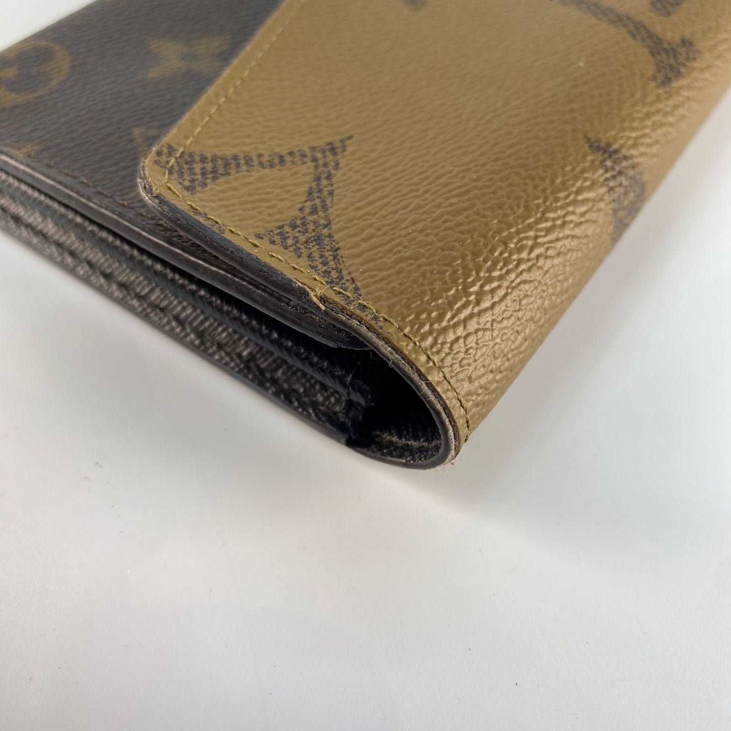 Louis Vuitton	Reverse Monogram Wallet