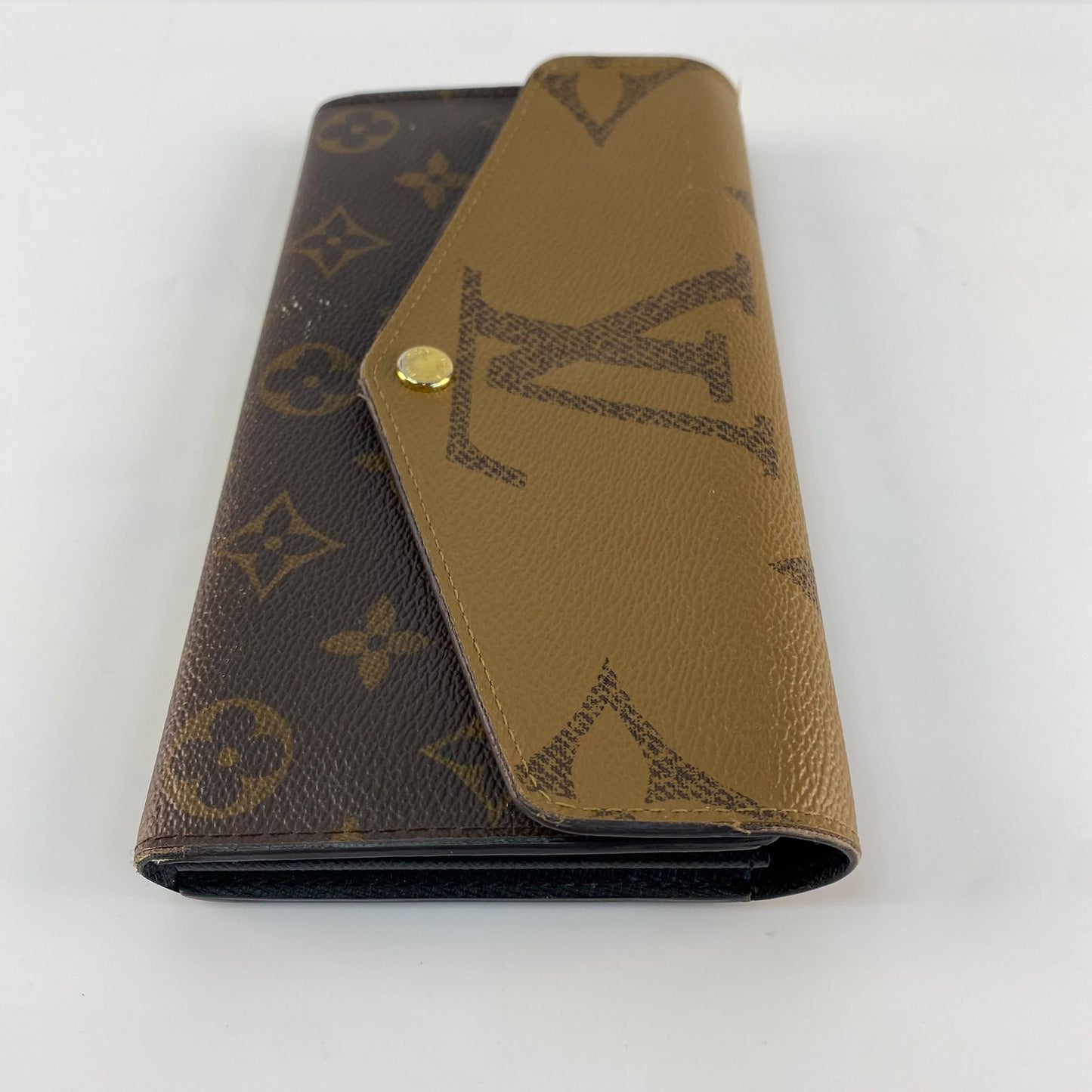 Louis Vuitton	Reverse Monogram Wallet